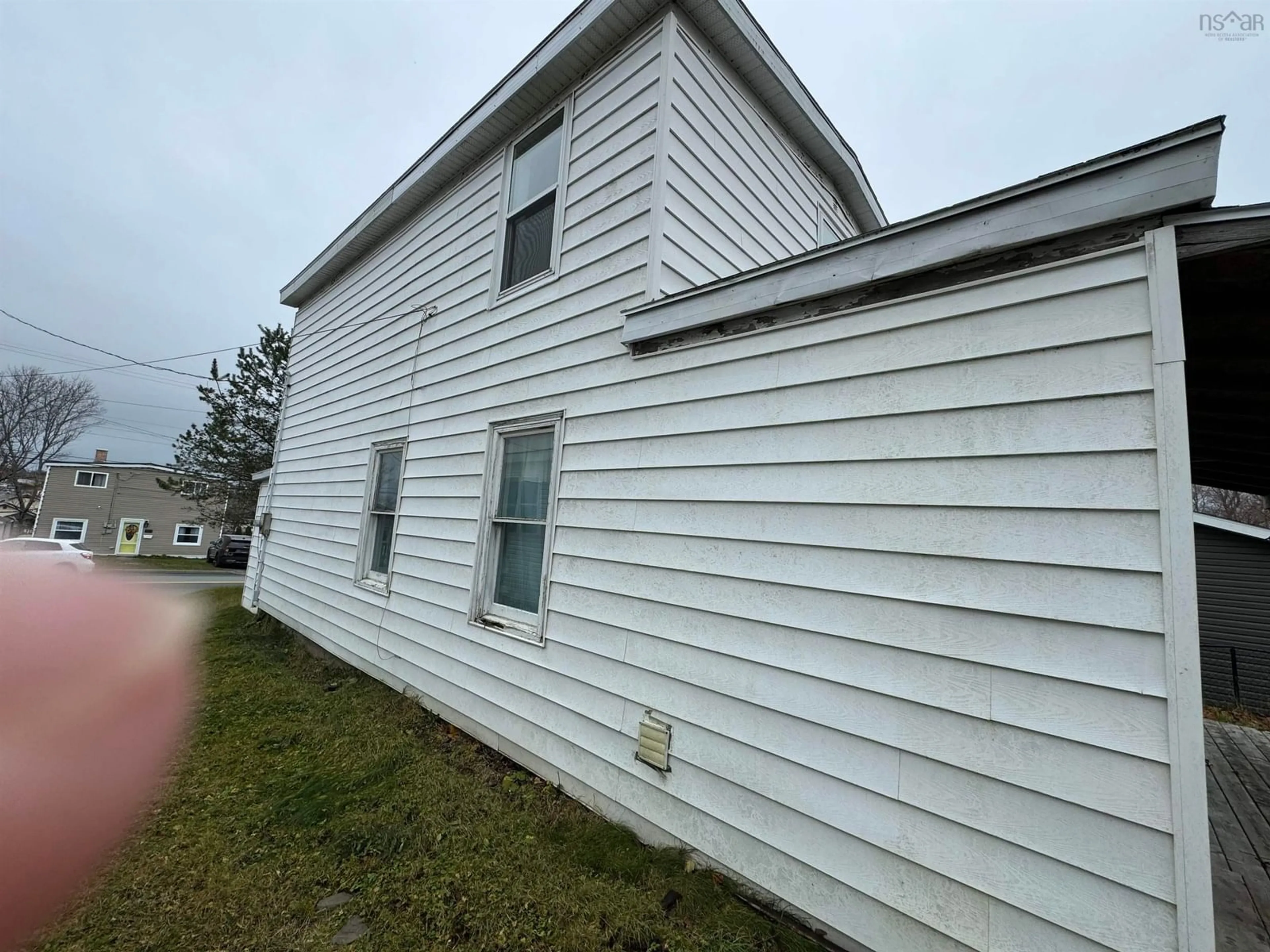 Home with vinyl exterior material, building for 50 Blowers St, North Sydney Nova Scotia B2A 2Y7