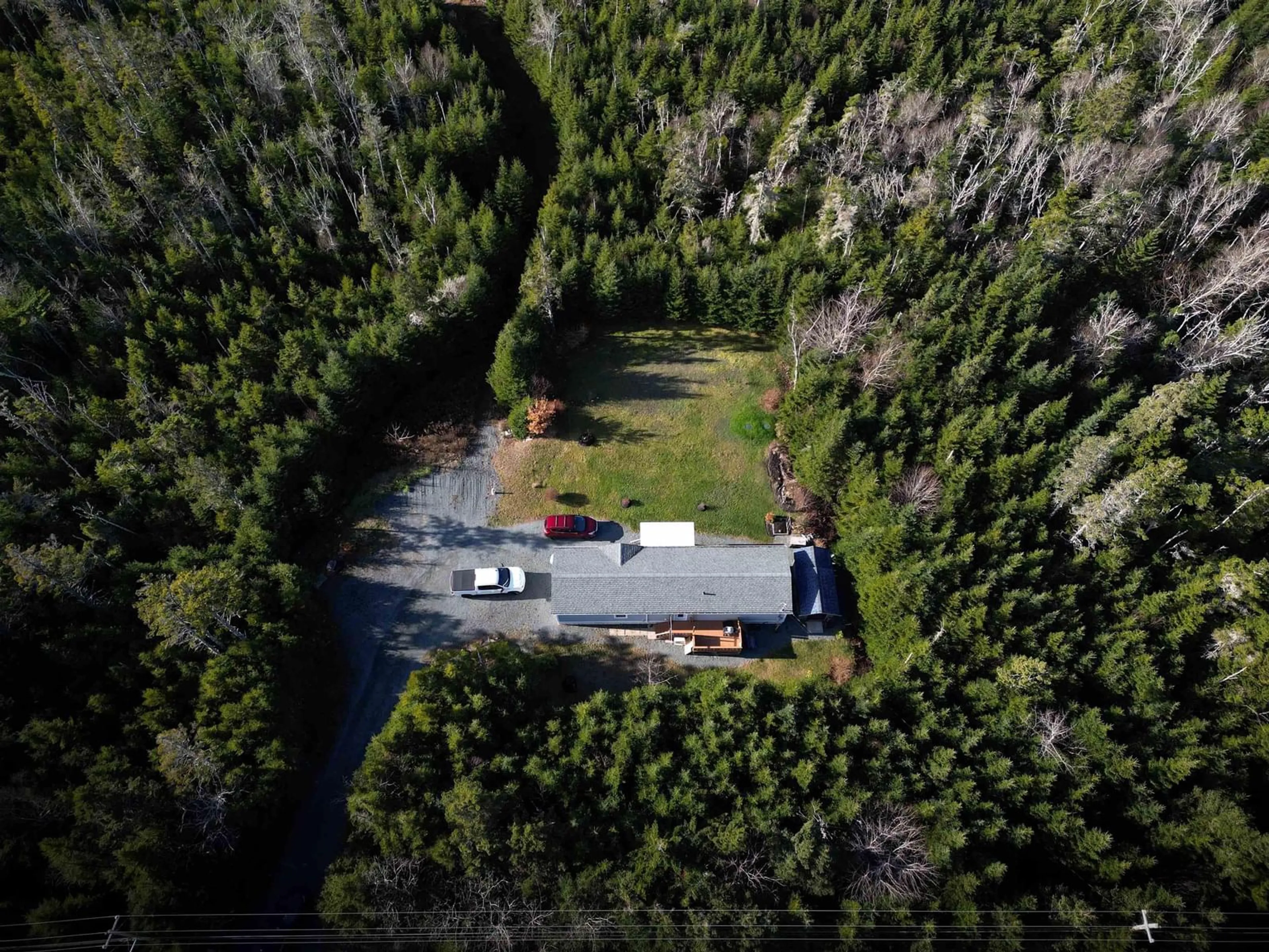 A pic from outside/outdoor area/front of a property/back of a property/a pic from drone, forest/trees view for 9408 Peggy's Cove Rd, Hackett's Cove Nova Scotia B3Z 3N2