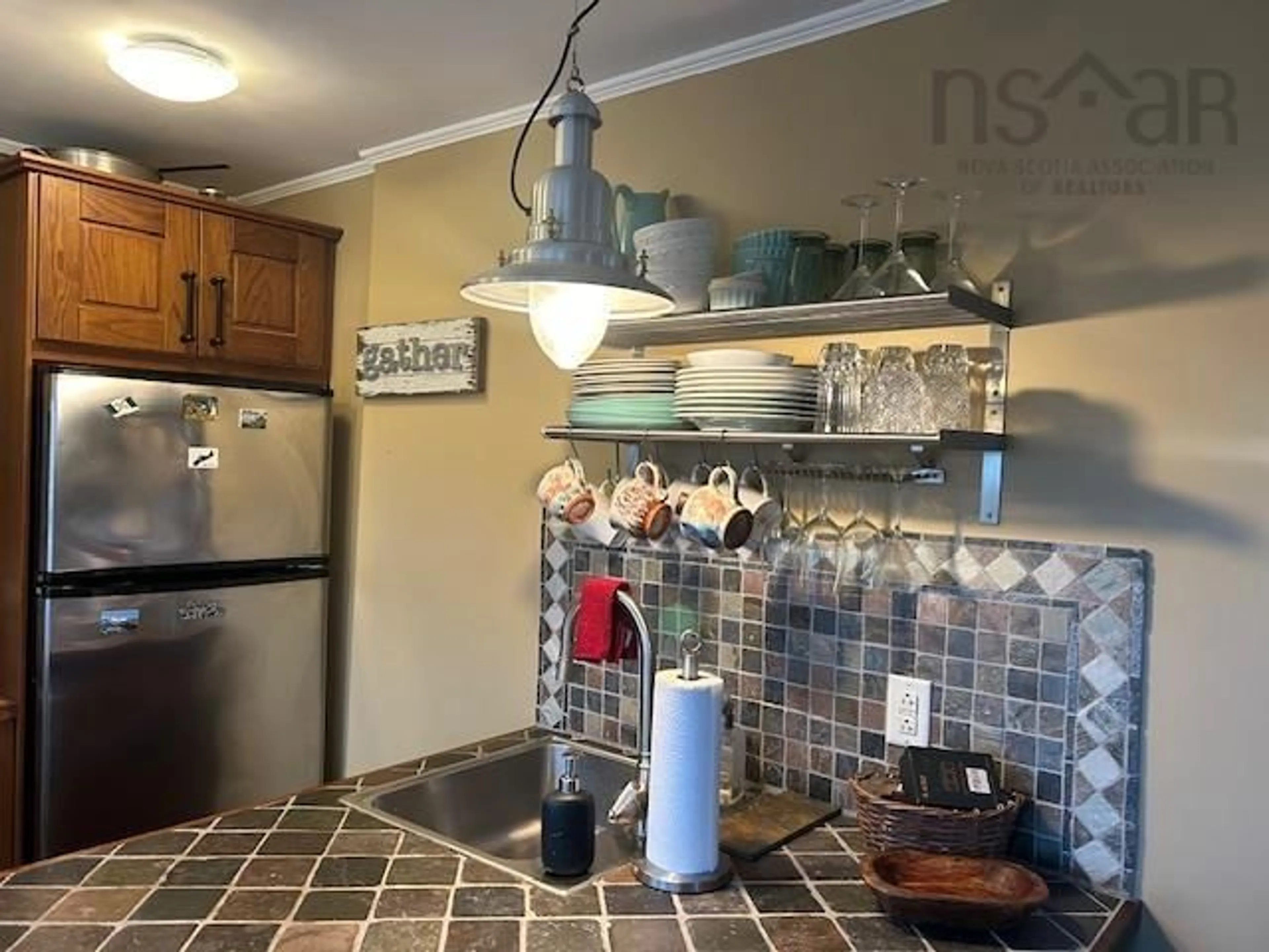 Standard kitchen, ceramic/tile floor for 19 Cove Rd, West Arichat Nova Scotia B0E 3J0