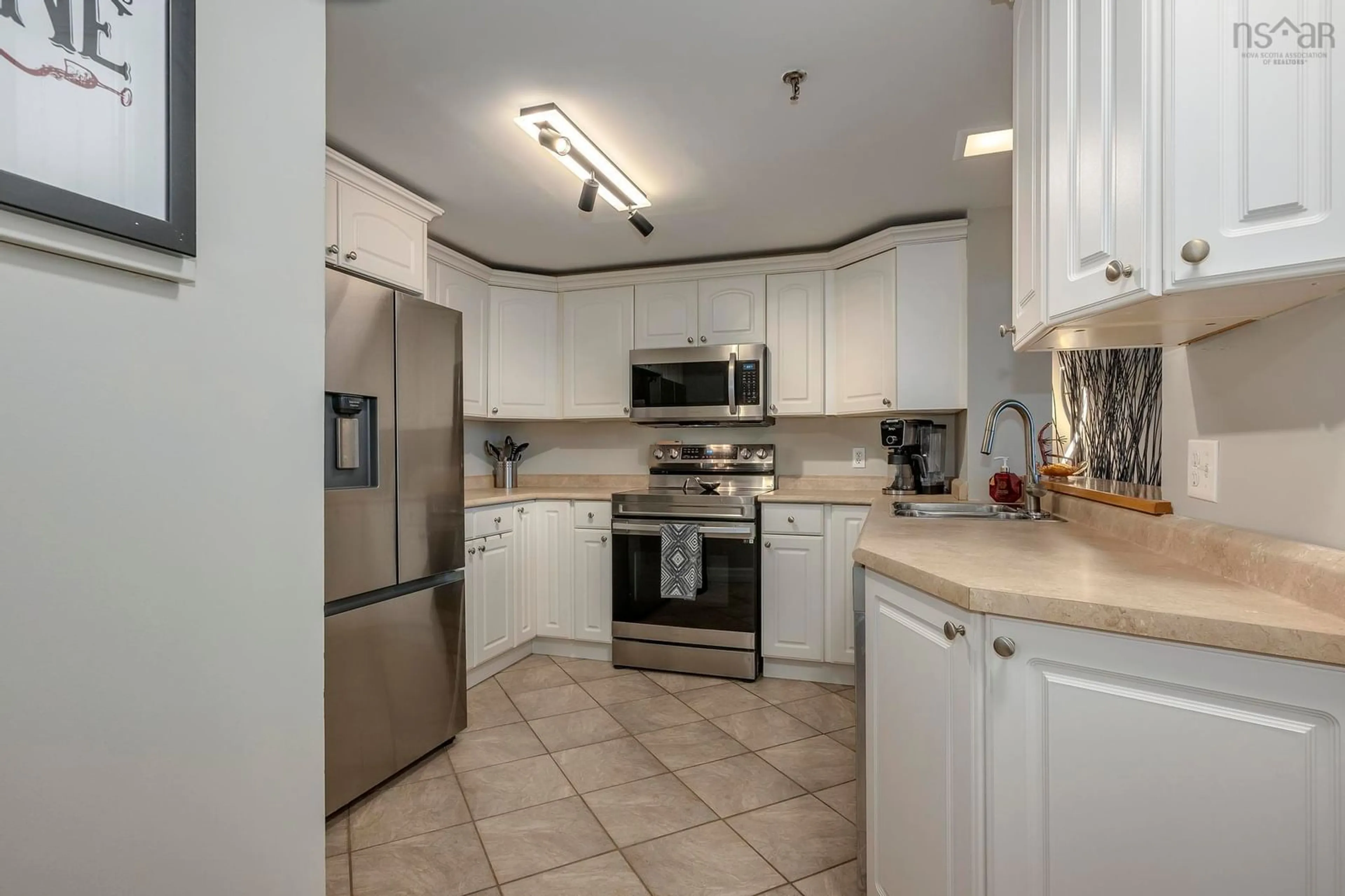 Standard kitchen, ceramic/tile floor for 1 Prince St #111, Dartmouth Nova Scotia B2Y 4L3