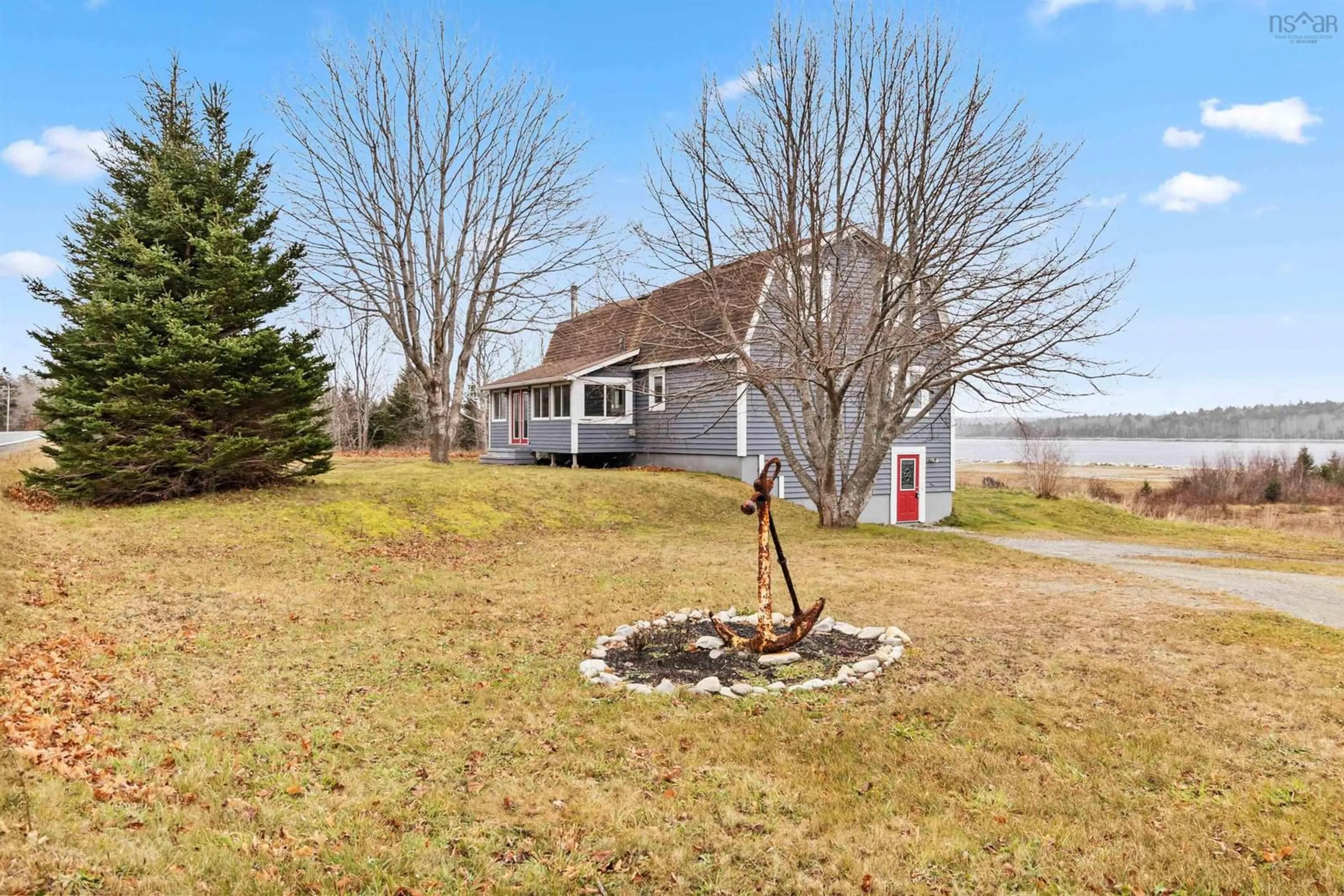 A pic from outside/outdoor area/front of a property/back of a property/a pic from drone, water/lake/river/ocean view for 5817 Highway 3, East Jordan Nova Scotia B0T 1J0