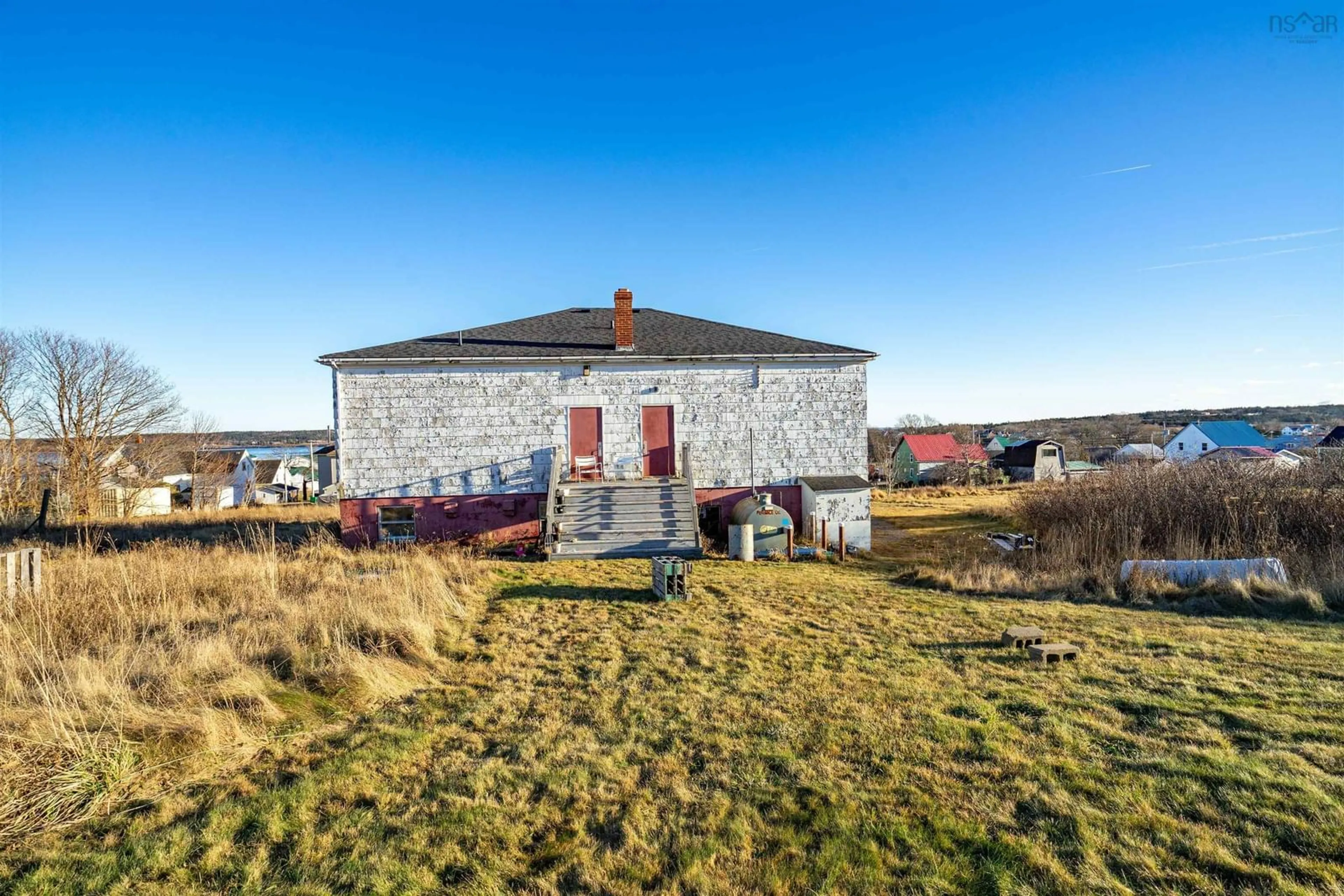 A pic from outside/outdoor area/front of a property/back of a property/a pic from drone, building for 63 Second Street, Westport Nova Scotia B0V 1H0