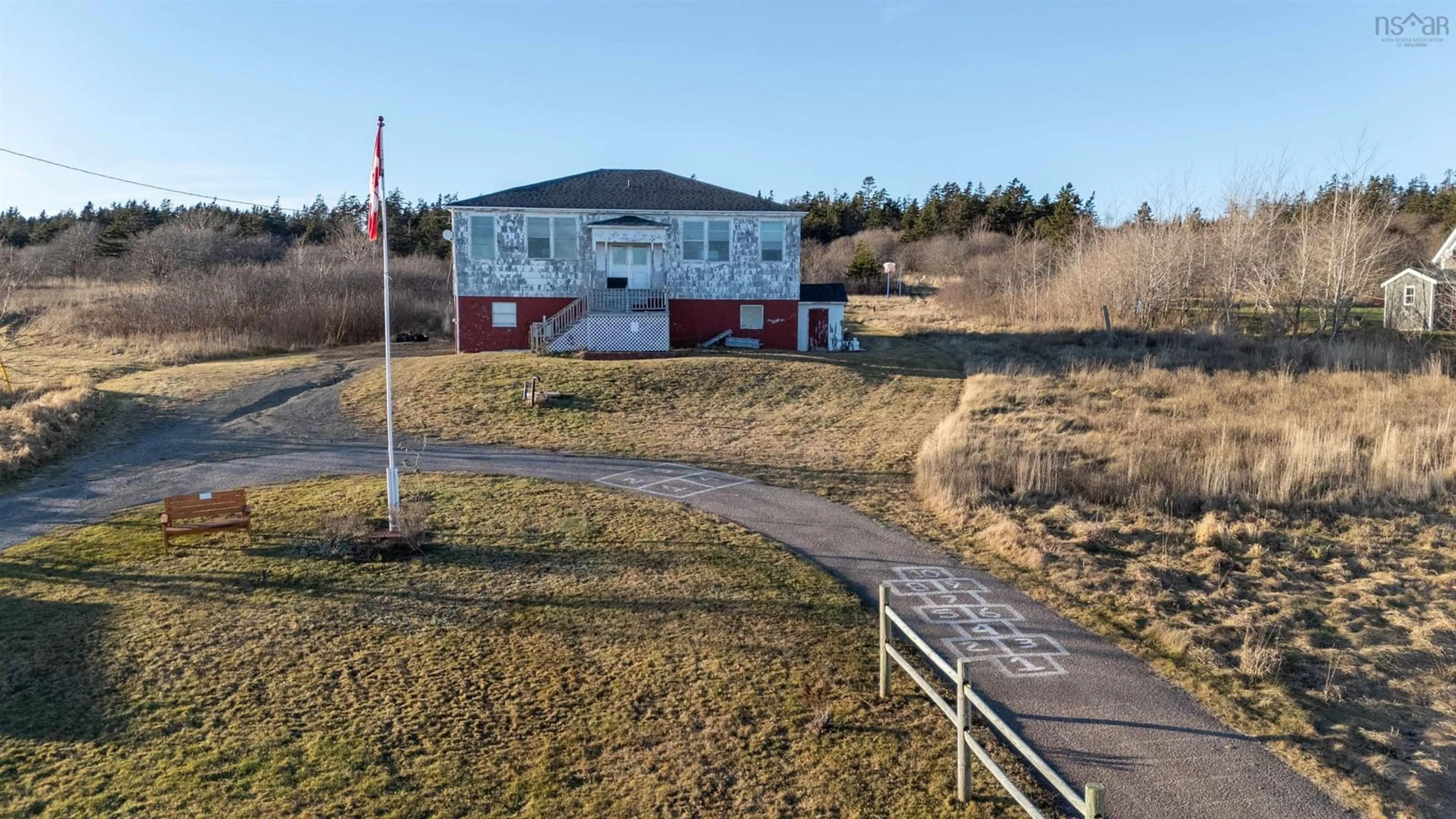 A pic from outside/outdoor area/front of a property/back of a property/a pic from drone, building for 63 Second Street, Westport Nova Scotia B0V 1H0