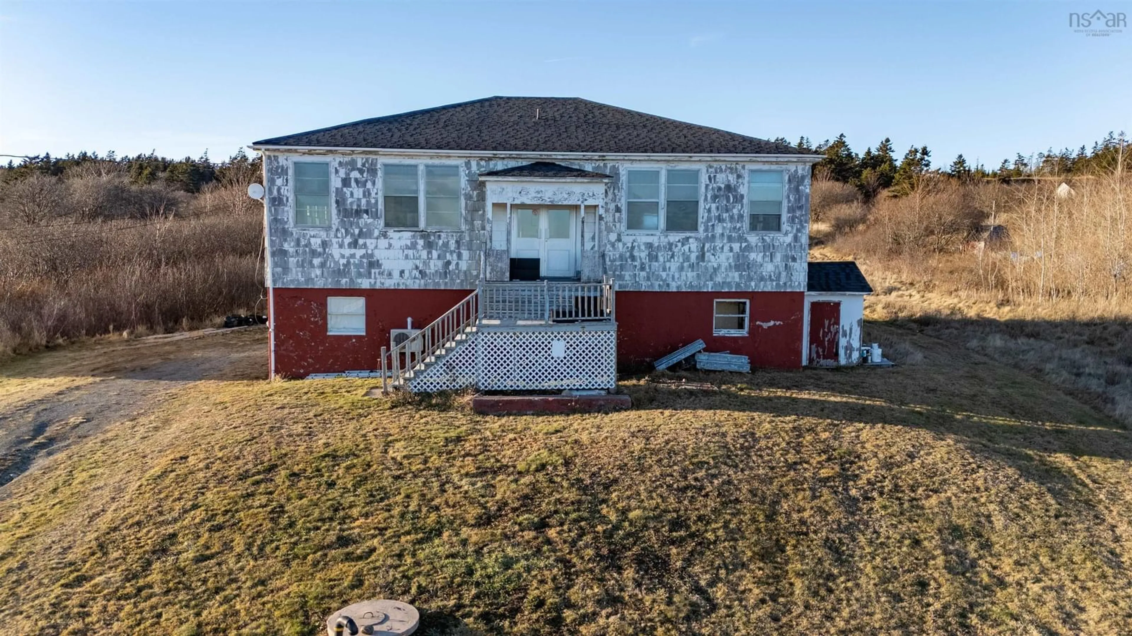 A pic from outside/outdoor area/front of a property/back of a property/a pic from drone, building for 63 Second Street, Westport Nova Scotia B0V 1H0