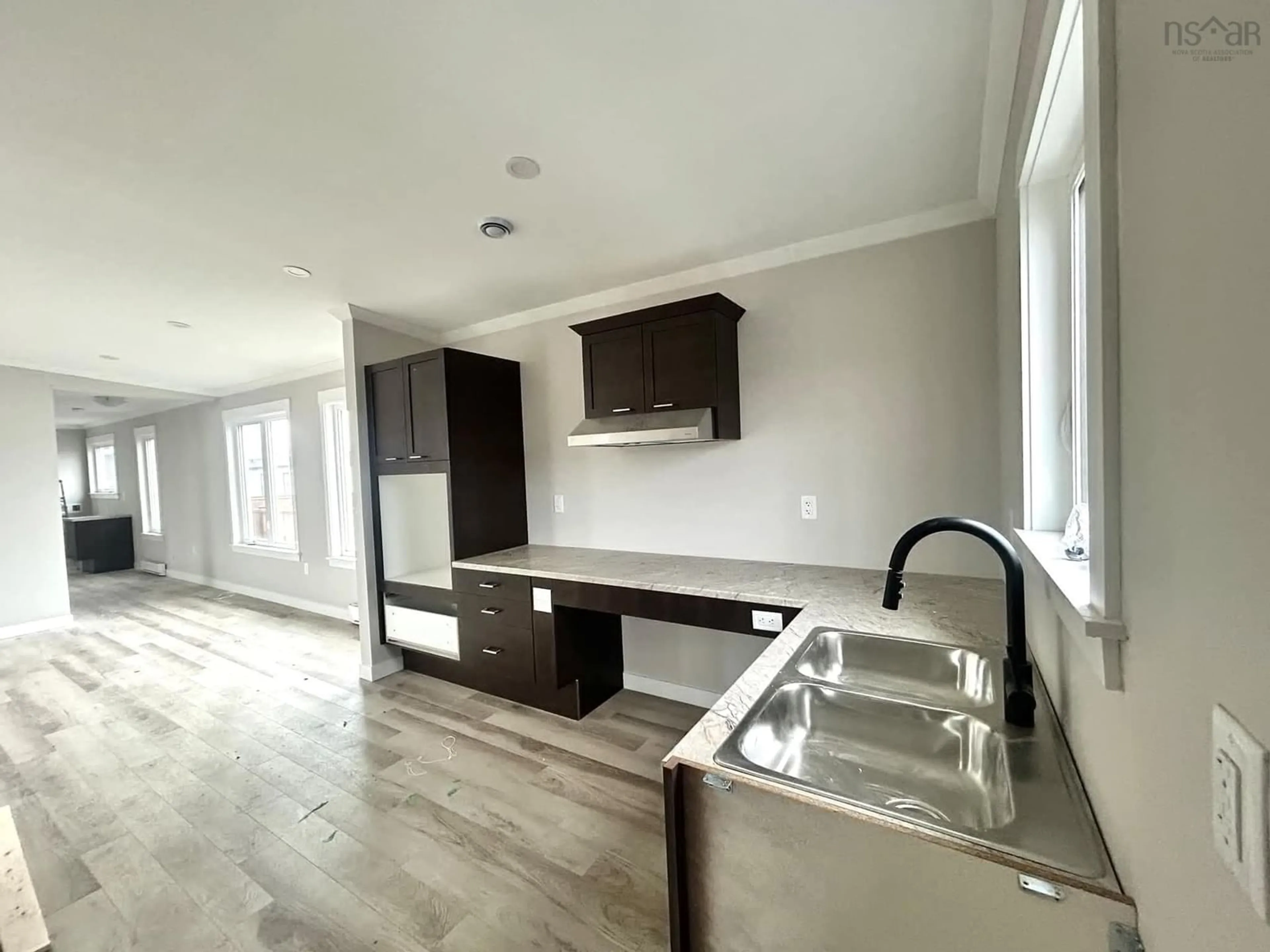 Open concept kitchen, wood/laminate floor for 278 Helmsley Cres, Elmsdale Nova Scotia B2S 0H4