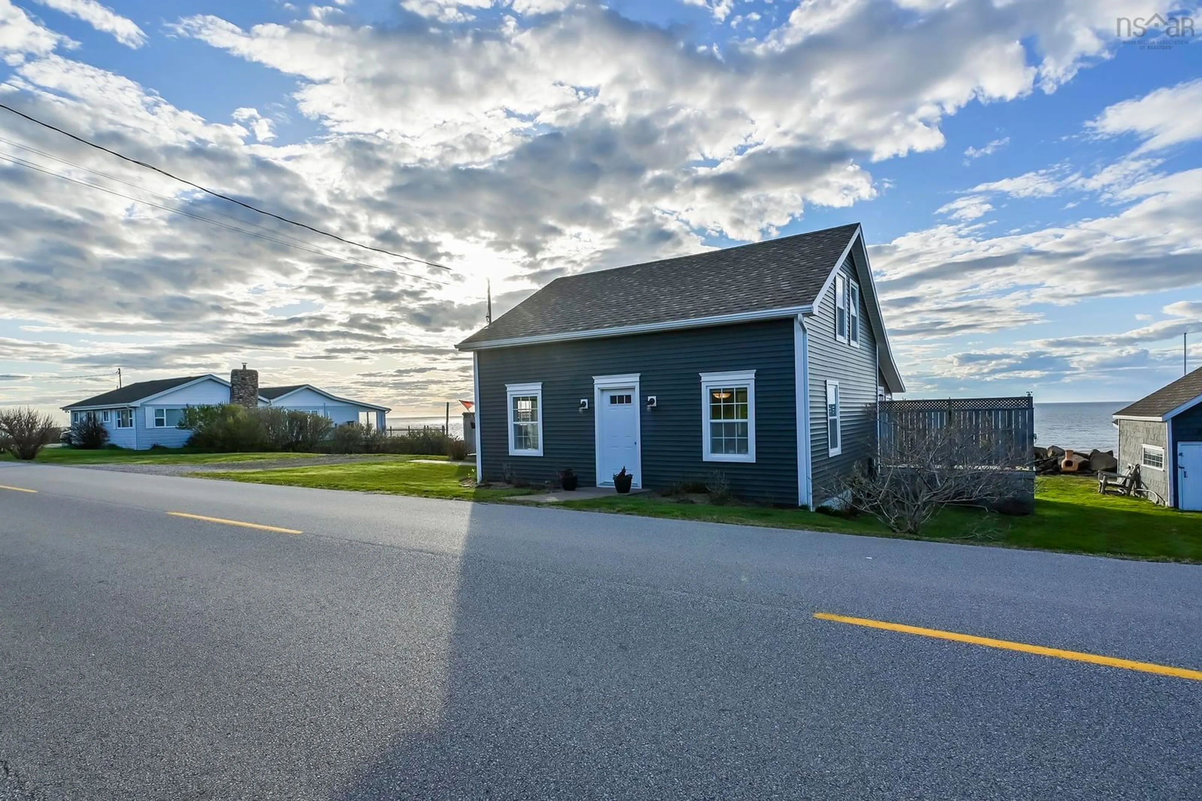 A pic from outside/outdoor area/front of a property/back of a property/a pic from drone, street for 12271 Shore Rd, Port George Nova Scotia B0S 1P0