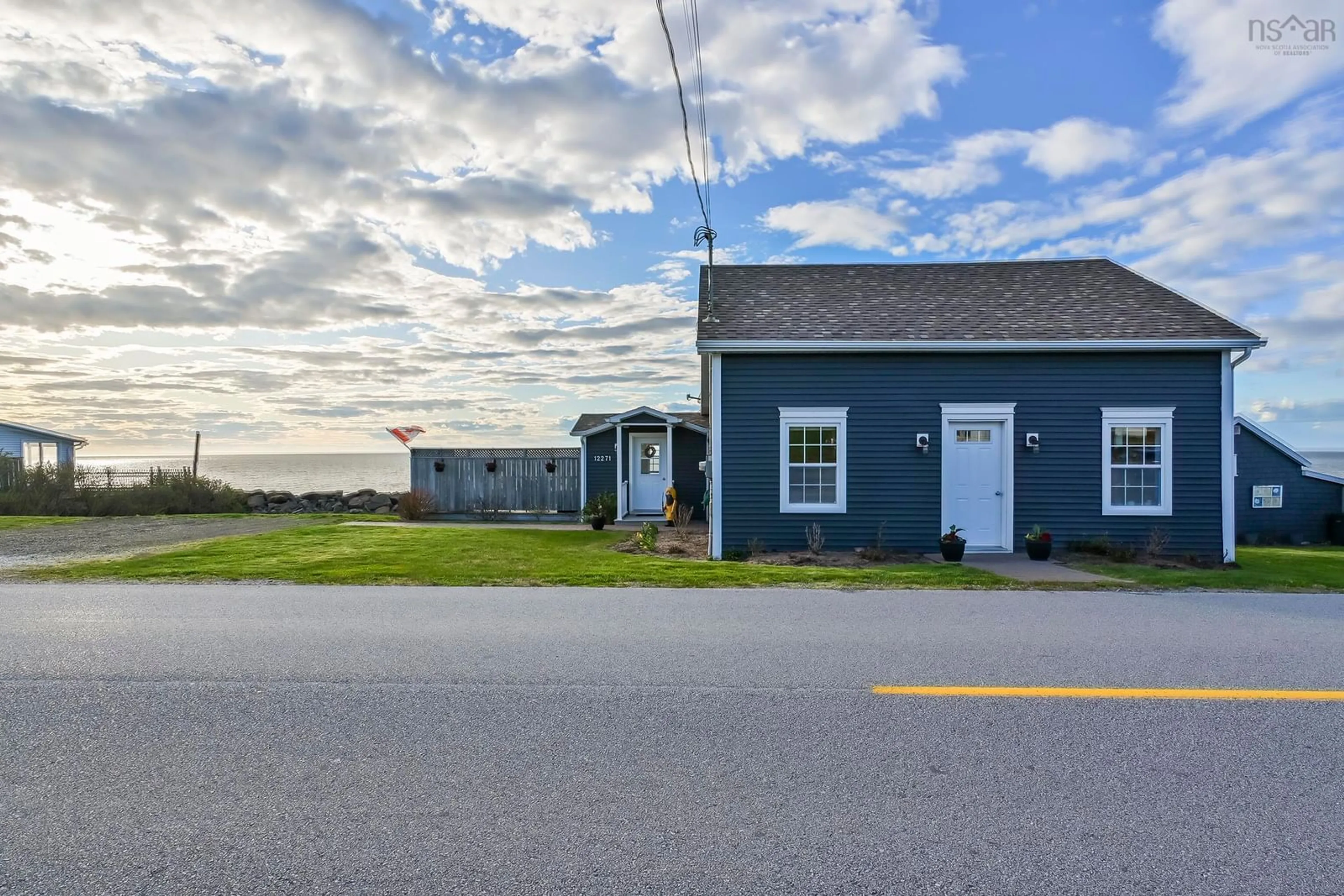 A pic from outside/outdoor area/front of a property/back of a property/a pic from drone, street for 12271 Shore Rd, Port George Nova Scotia B0S 1P0