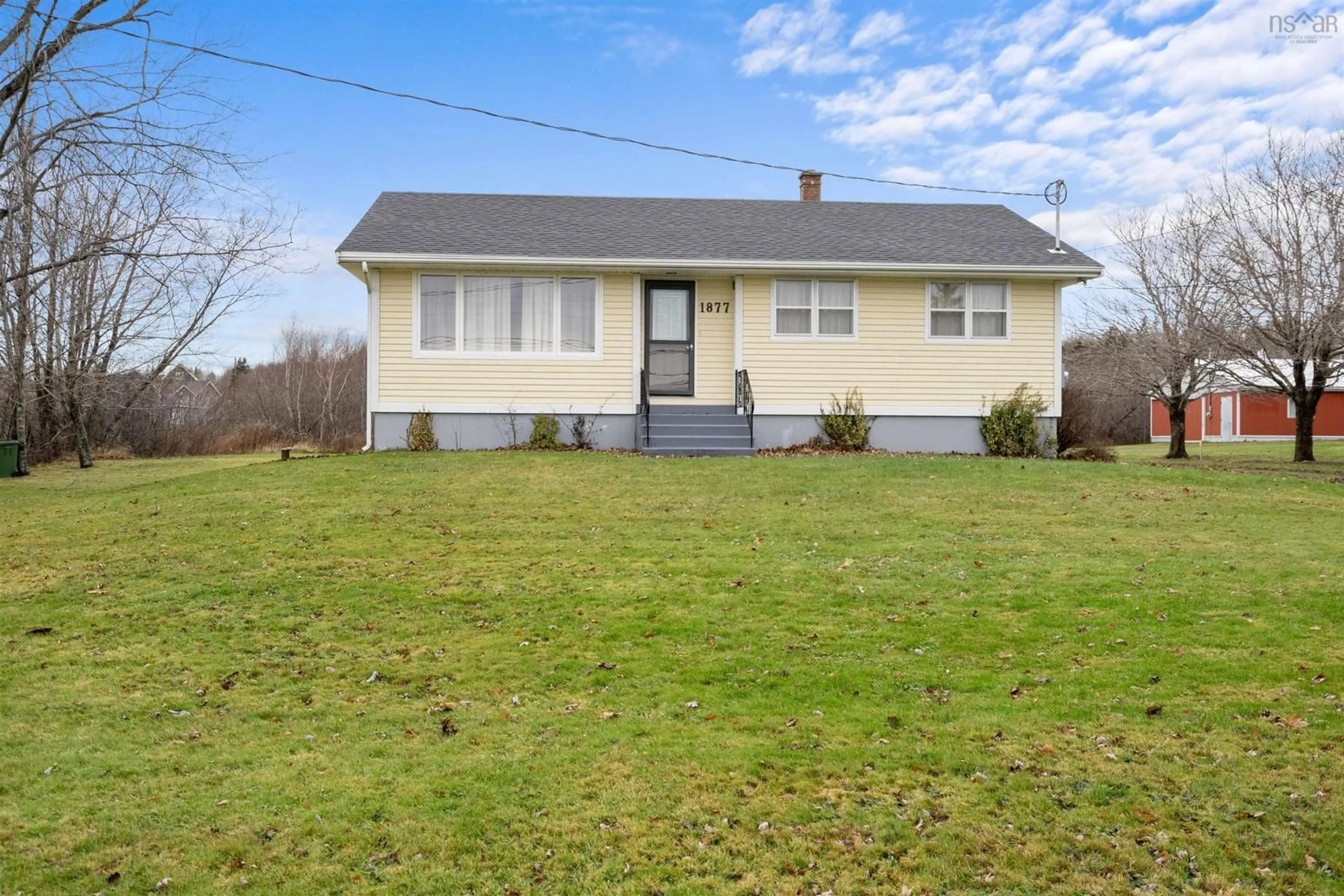 Home with vinyl exterior material, street for 1877 Highway 376, Lyons Brook Nova Scotia B0K 1H0