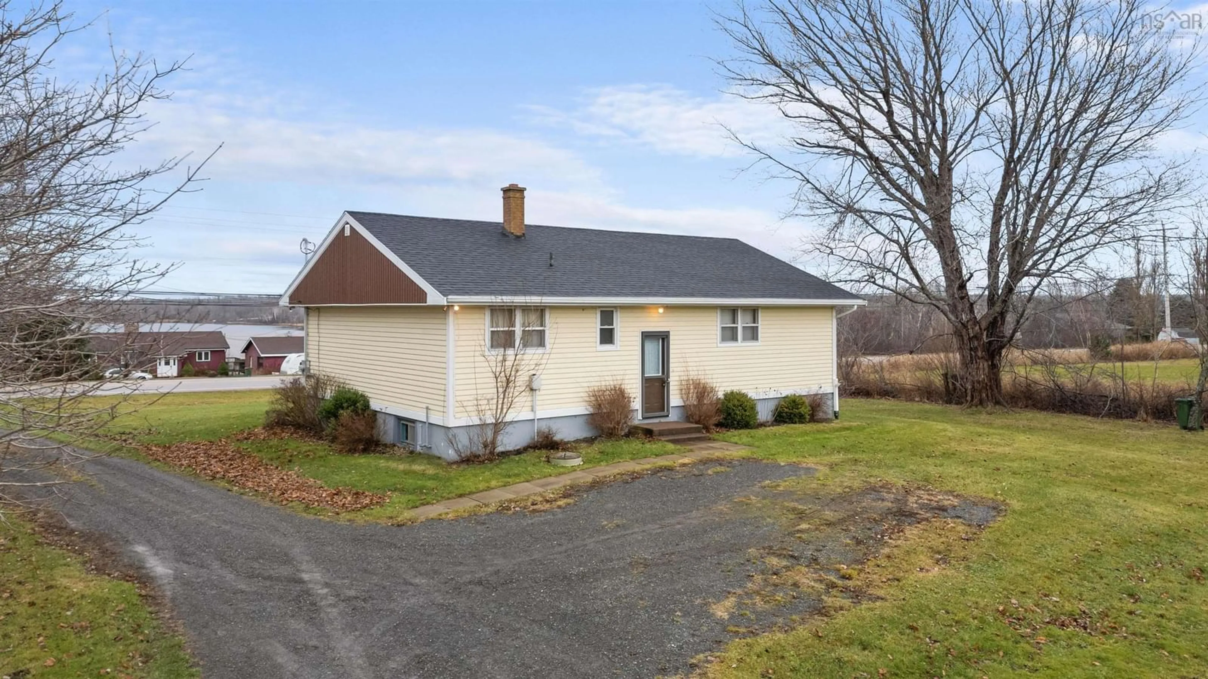 Home with vinyl exterior material, street for 1877 Highway 376, Lyons Brook Nova Scotia B0K 1H0