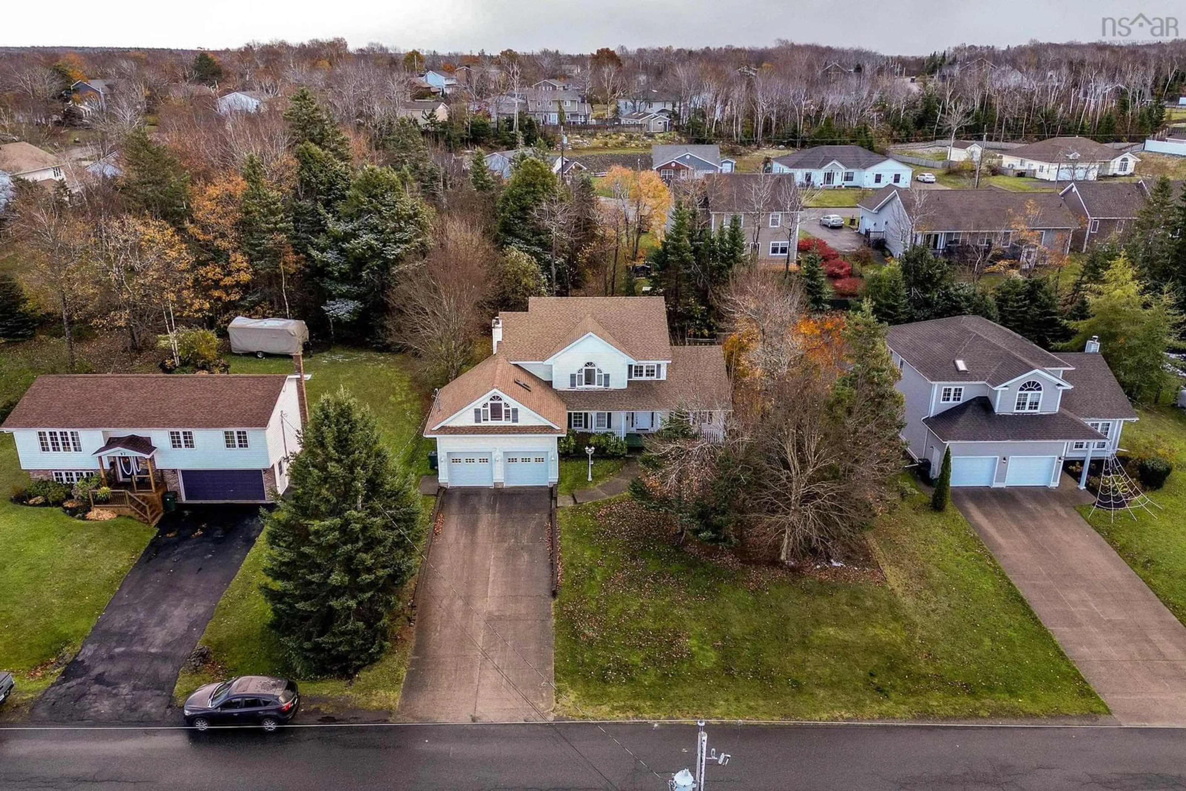 A pic from outside/outdoor area/front of a property/back of a property/a pic from drone, street for 85 Carmichael Dr, Sydney River Nova Scotia B1S 3J1