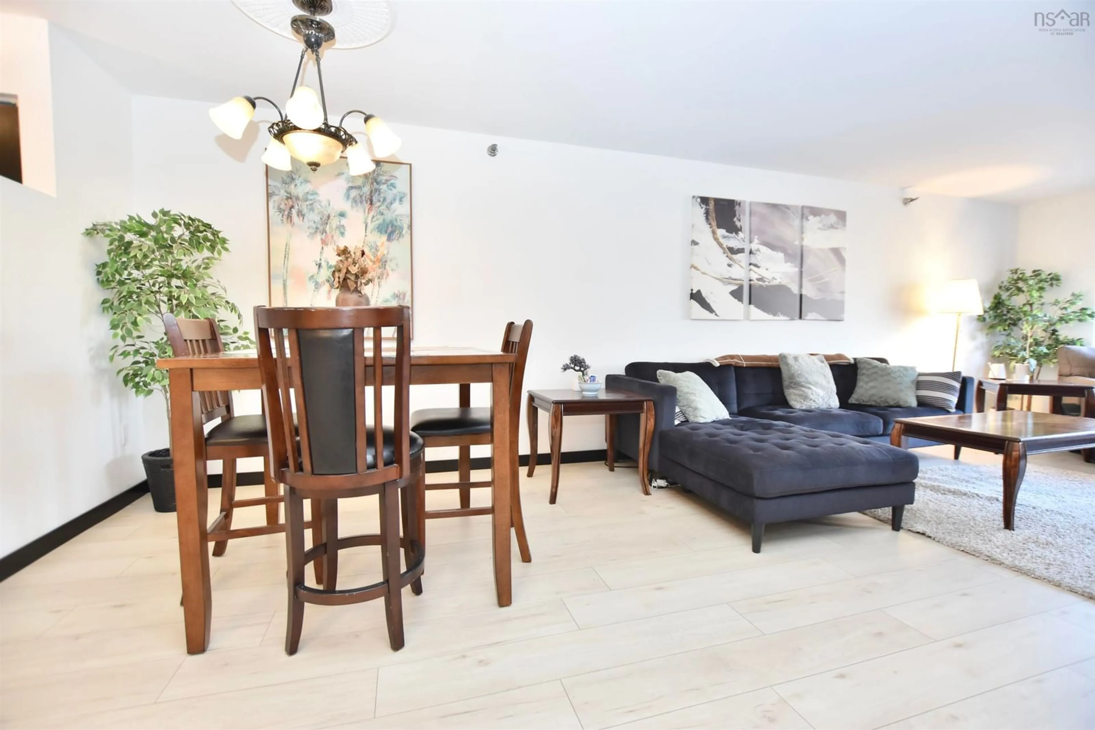 Living room with furniture, wood/laminate floor for 93 Kearney Lake Dr #305, Halifax Nova Scotia B3M 4E7