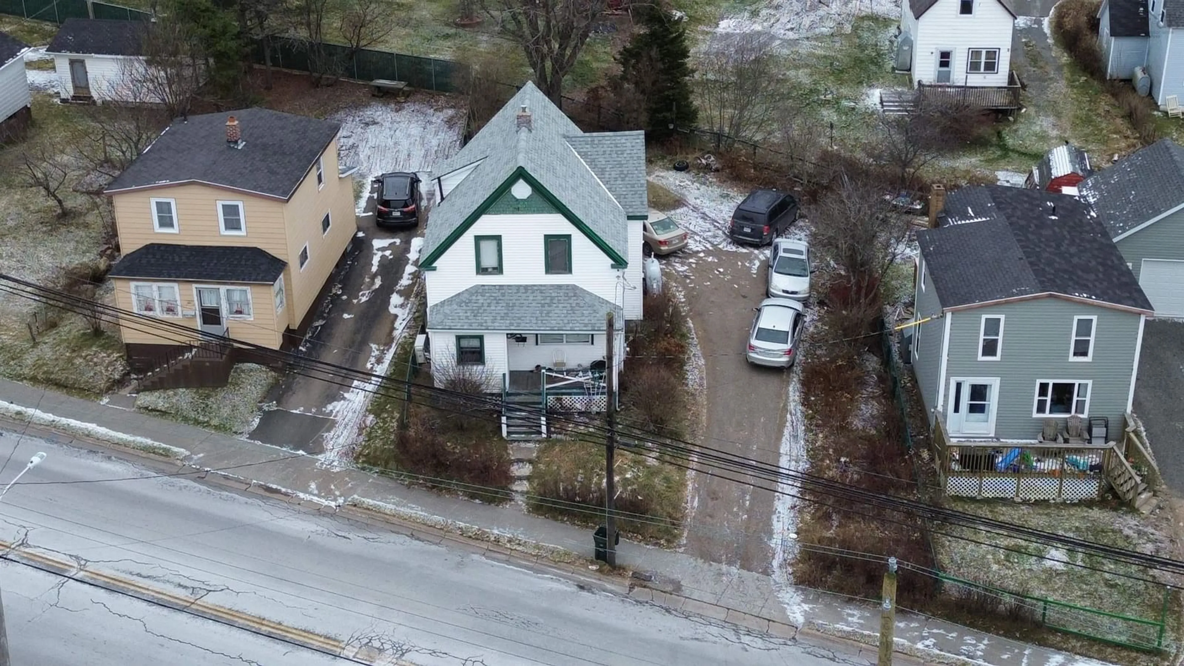 A pic from outside/outdoor area/front of a property/back of a property/a pic from drone, street for 1412 Victoria Rd, Sydney Nova Scotia B1N 1M5