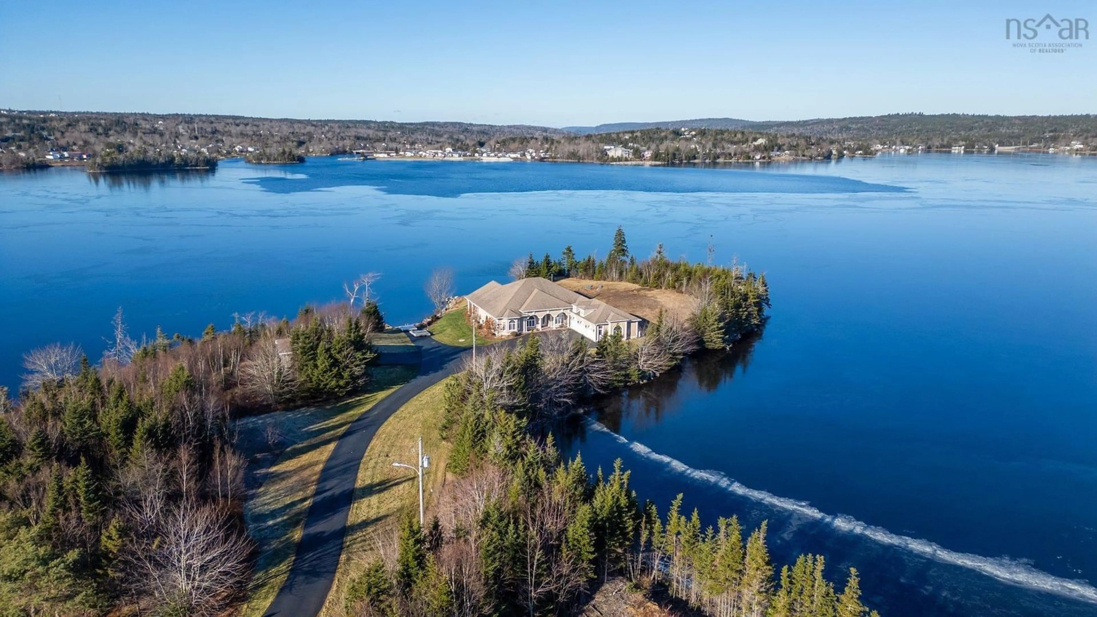 A pic from outside/outdoor area/front of a property/back of a property/a pic from drone, water/lake/river/ocean view for 80 Joan Elizabeth Way, Porters Lake Nova Scotia B3E 1N9