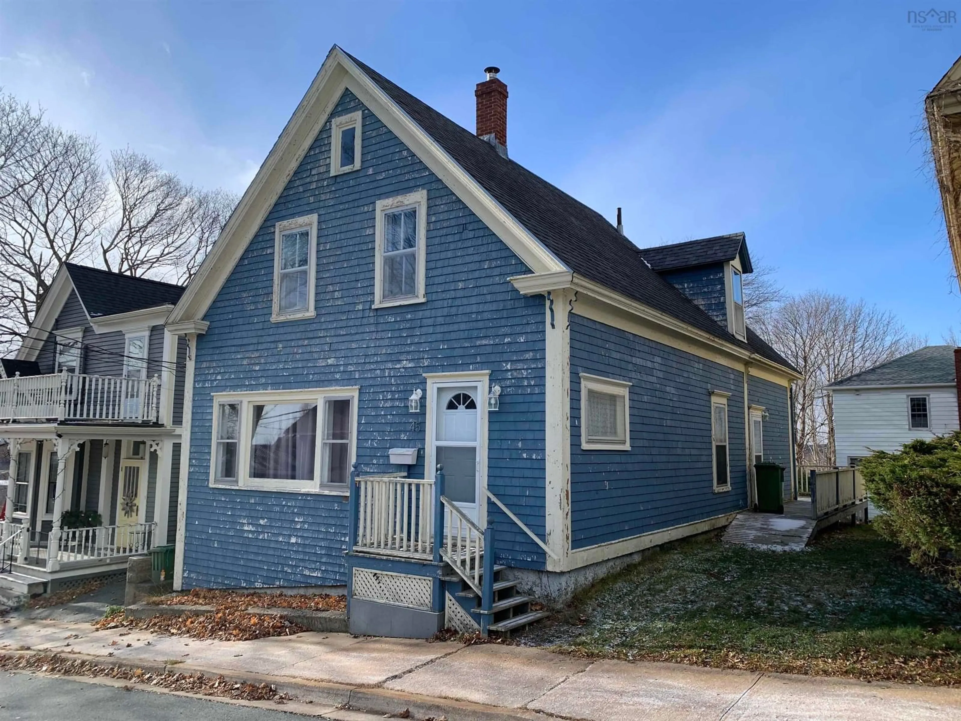 Home with vinyl exterior material, street for 45 Kaulbach St, Lunenburg Nova Scotia B0J 2C0