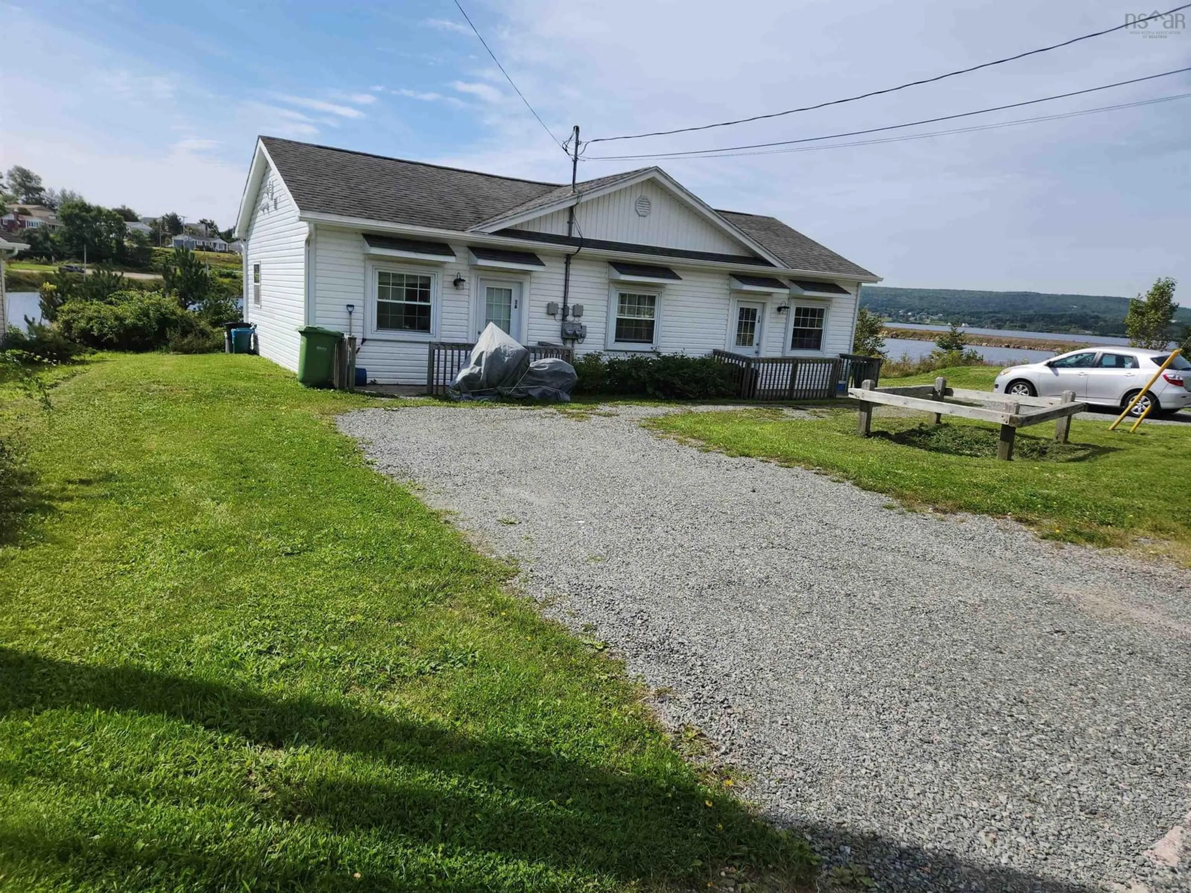 A pic from outside/outdoor area/front of a property/back of a property/a pic from drone, water/lake/river/ocean view for 3A & 3B Embree Island Rd, Port Hawkesbury Nova Scotia B9A 2A3