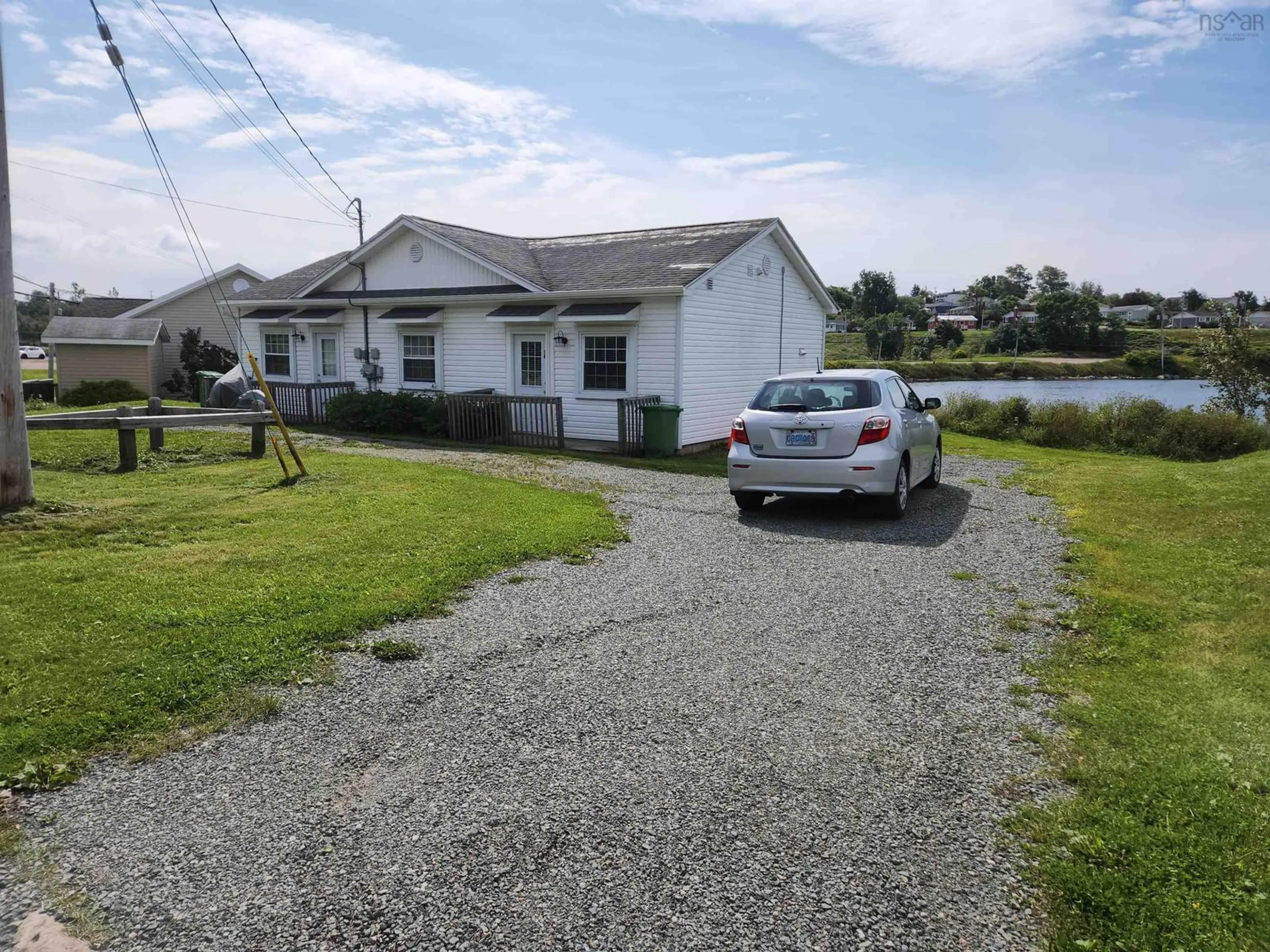 A pic from outside/outdoor area/front of a property/back of a property/a pic from drone, street for 3A & 3B Embree Island Rd, Port Hawkesbury Nova Scotia B9A 2A3