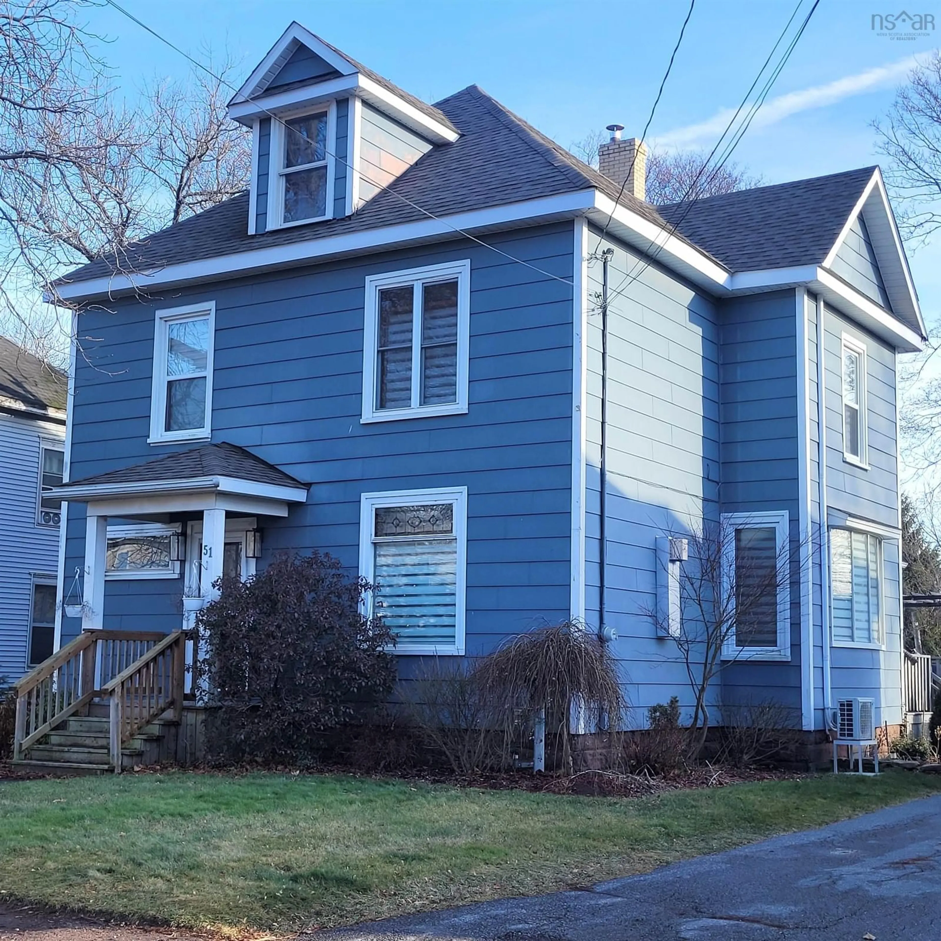 Home with vinyl exterior material, street for 51 Spring St, Amherst Nova Scotia B4H 1S3