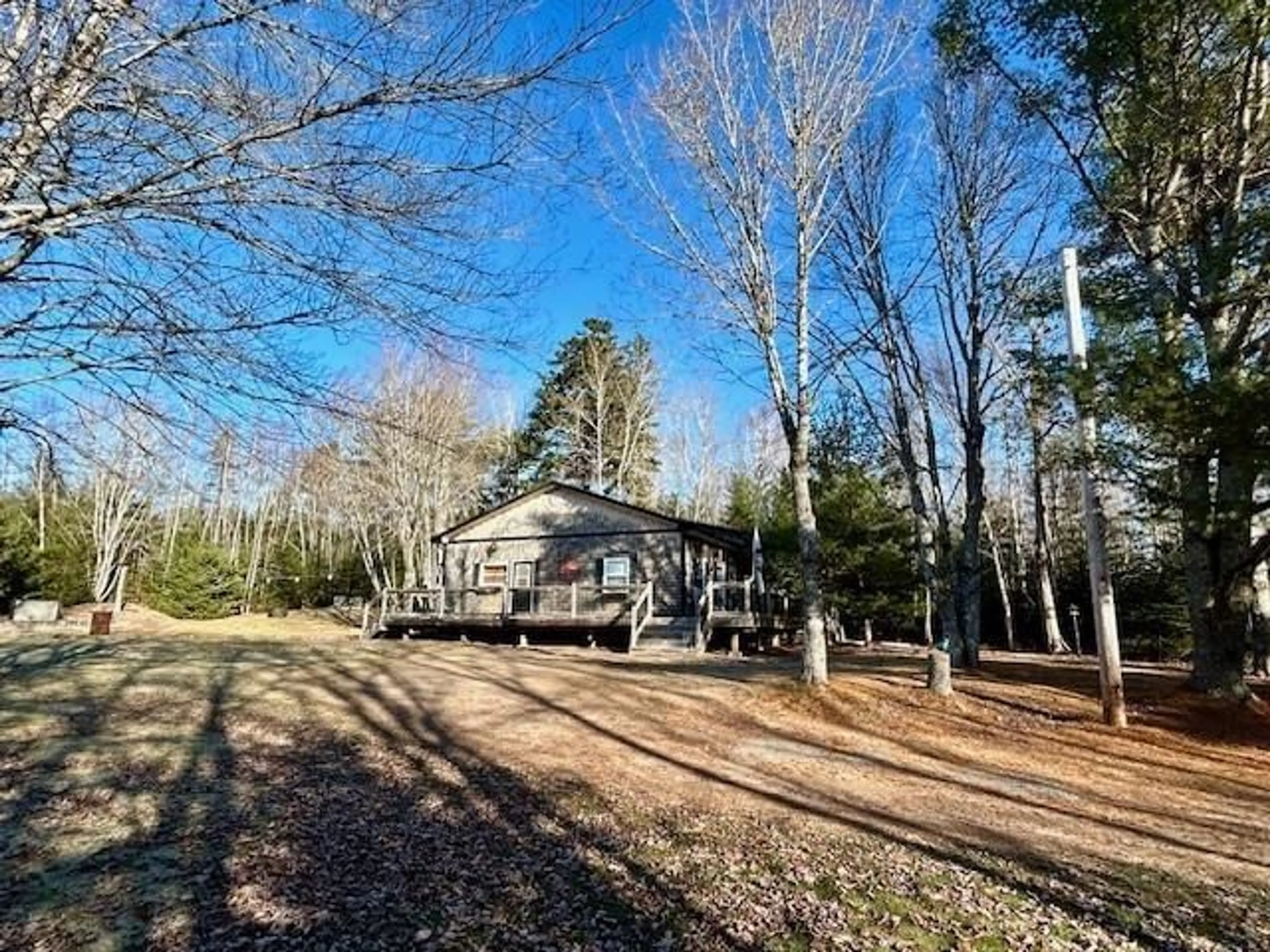 A pic from outside/outdoor area/front of a property/back of a property/a pic from drone, forest/trees view for 107 Ridge Rd, South Branch Nova Scotia B0N 2P0