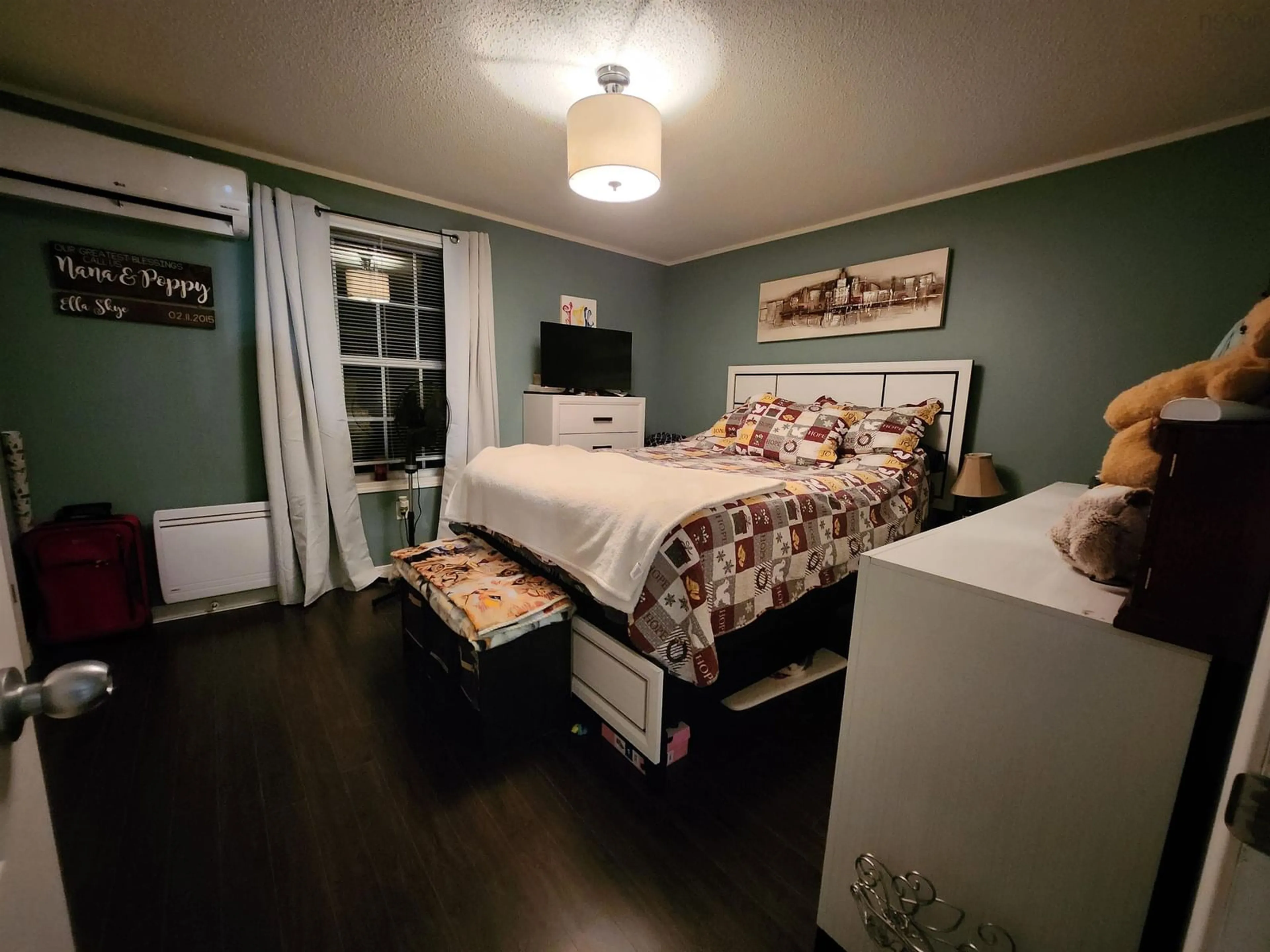 Bedroom with bed, wood/laminate floor for 1016 Bustin Ave, Beaver Bank Nova Scotia B4E 1K9