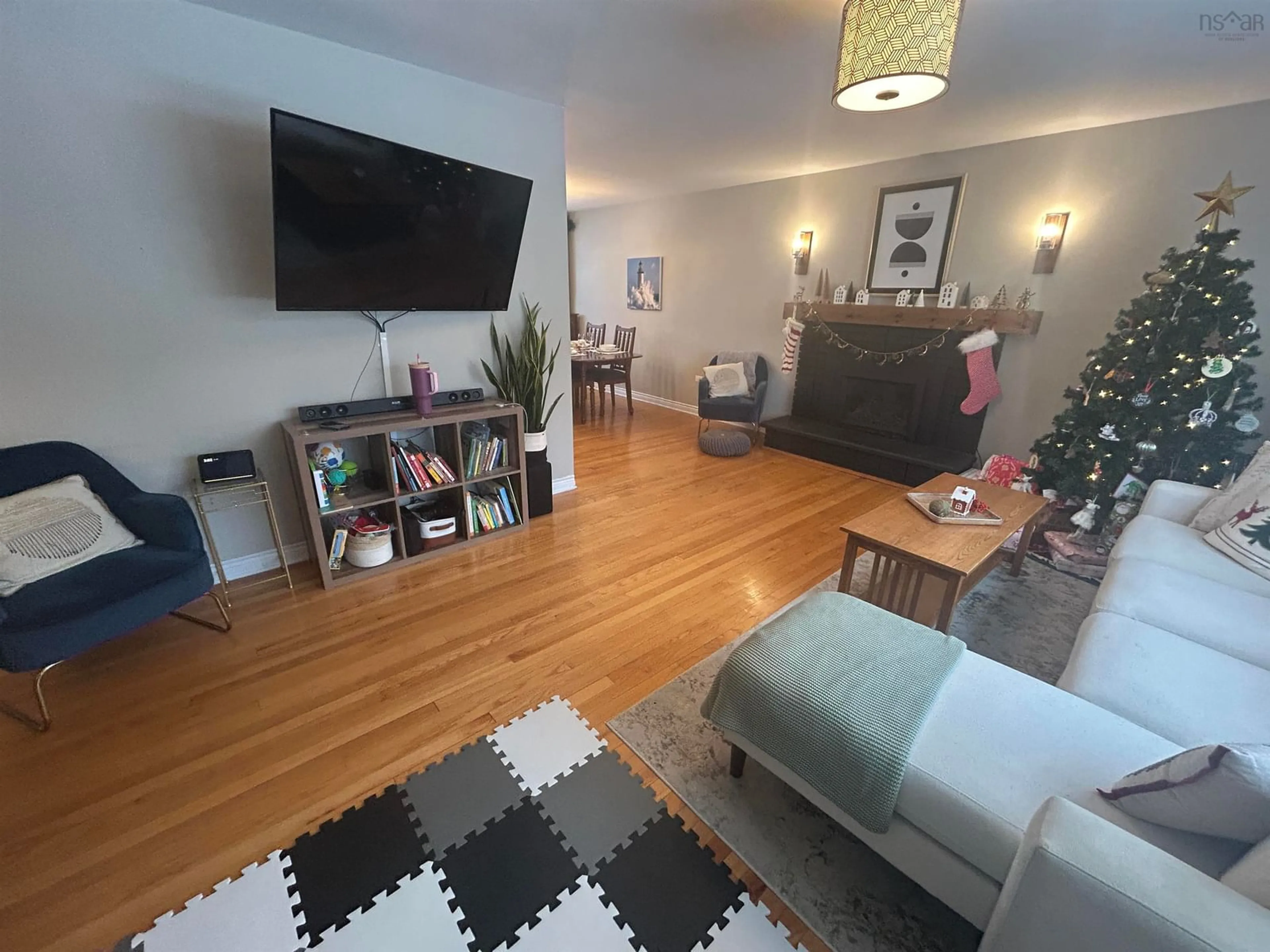 Living room with furniture, wood/laminate floor for 42 Arbor Drive, Antigonish Nova Scotia B2G 2H9