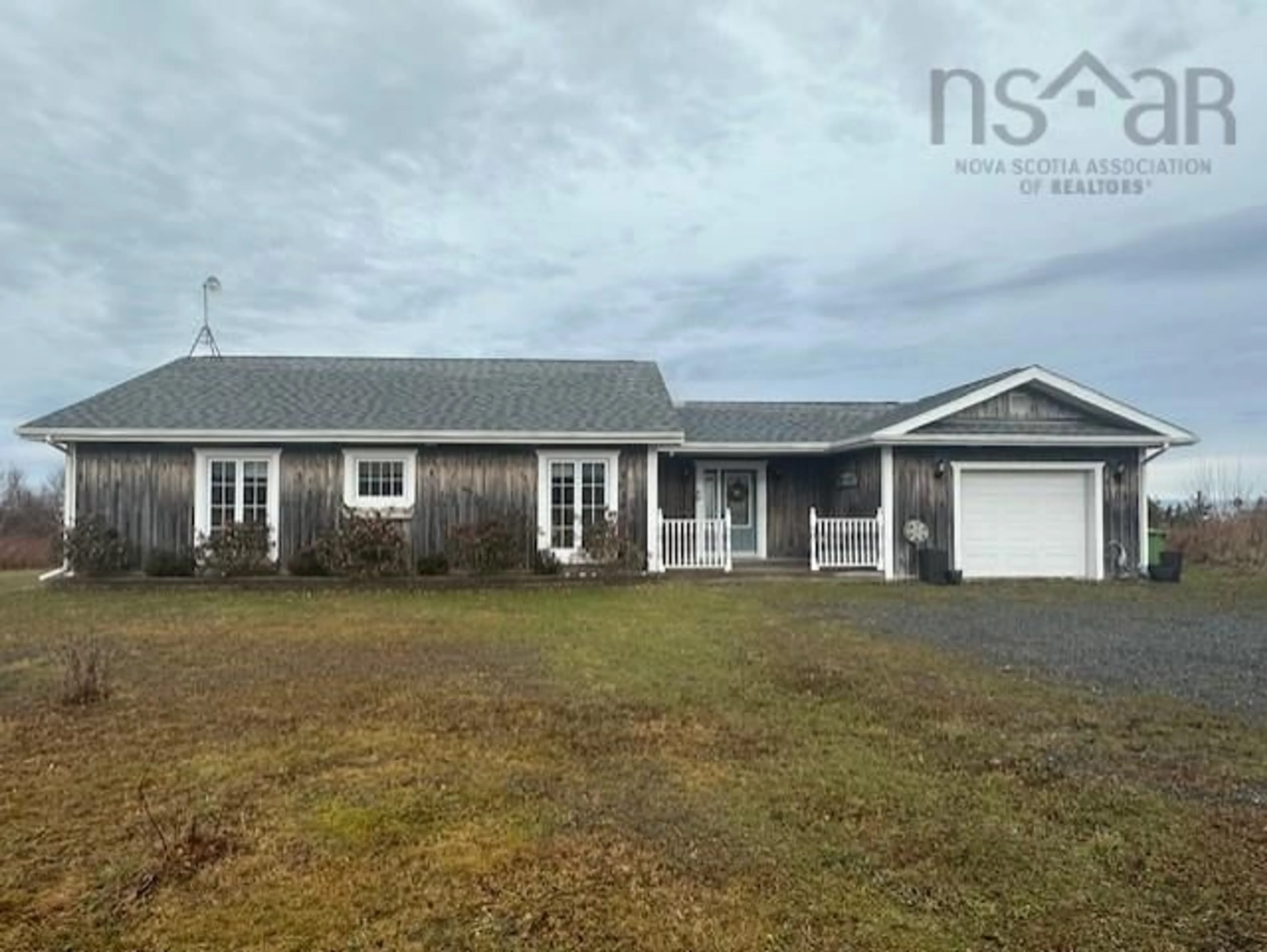 Home with vinyl exterior material, street for 12 Birch Water Dr, Big Island Nova Scotia B0K 1G0