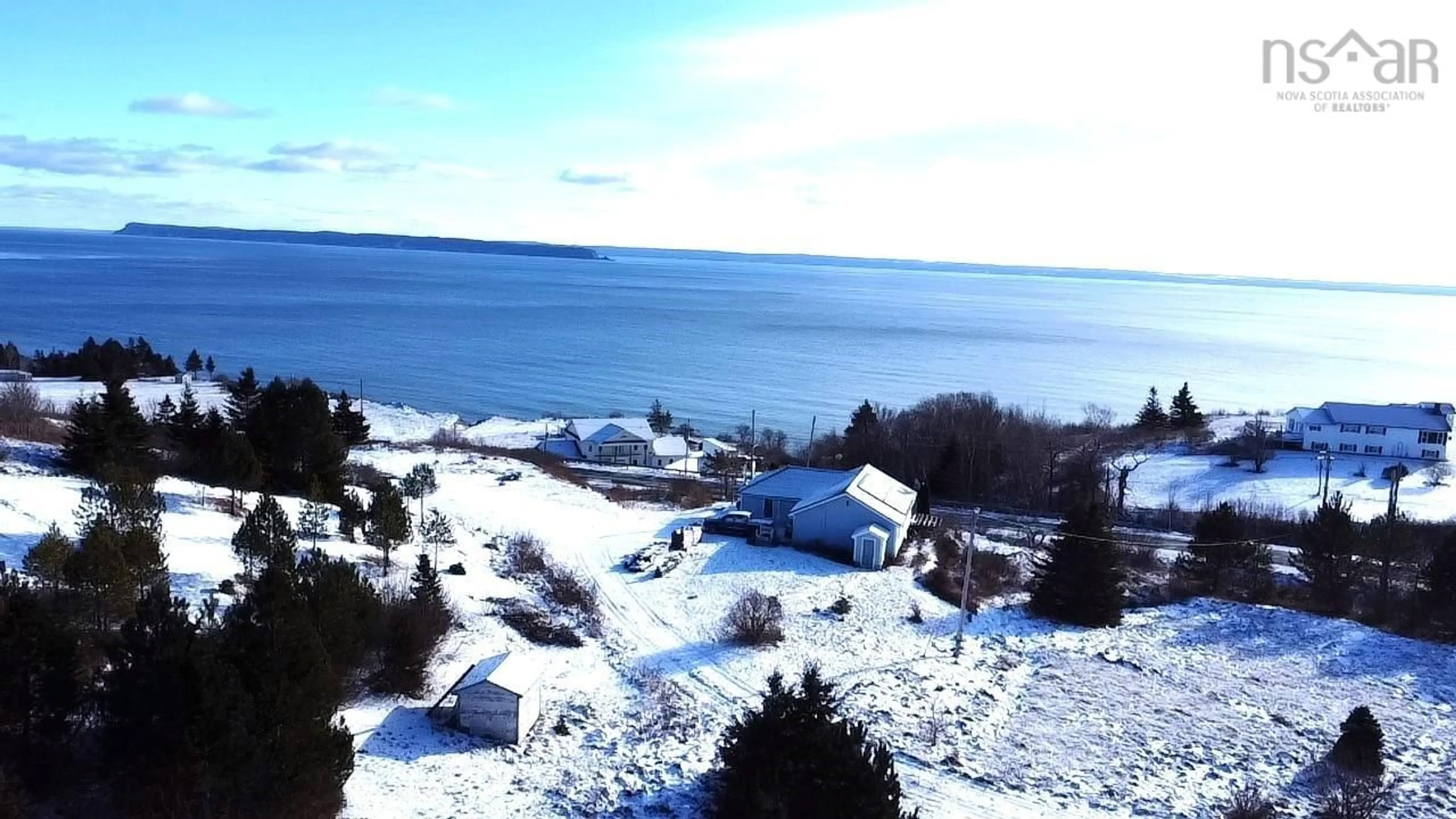 A pic from outside/outdoor area/front of a property/back of a property/a pic from drone, water/lake/river/ocean view for 8013 Hwy#209 Hwy, Wards Brook Nova Scotia B0M 1S0