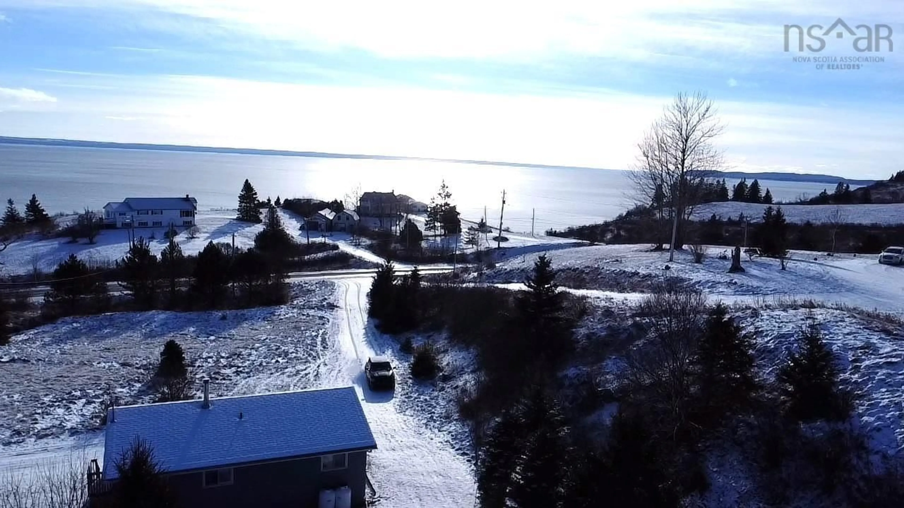 A pic from outside/outdoor area/front of a property/back of a property/a pic from drone, water/lake/river/ocean view for 8013 Hwy#209 Hwy, Wards Brook Nova Scotia B0M 1S0