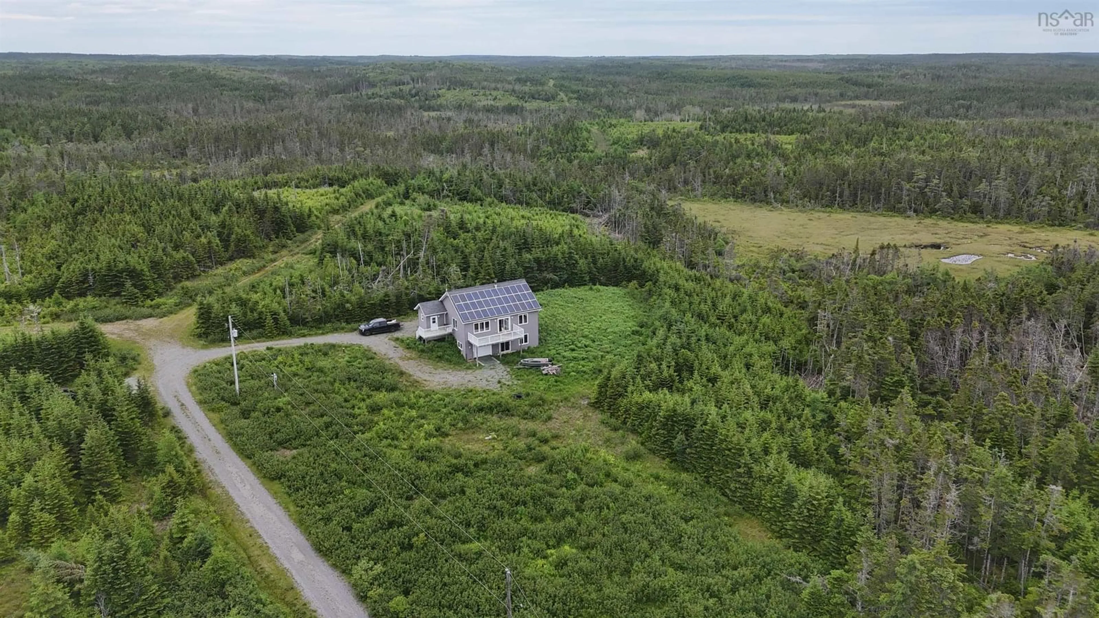 A pic from outside/outdoor area/front of a property/back of a property/a pic from drone, unknown for 4381 St. Peter's Fourchu Rd, Grand River Nova Scotia B0E 1M0