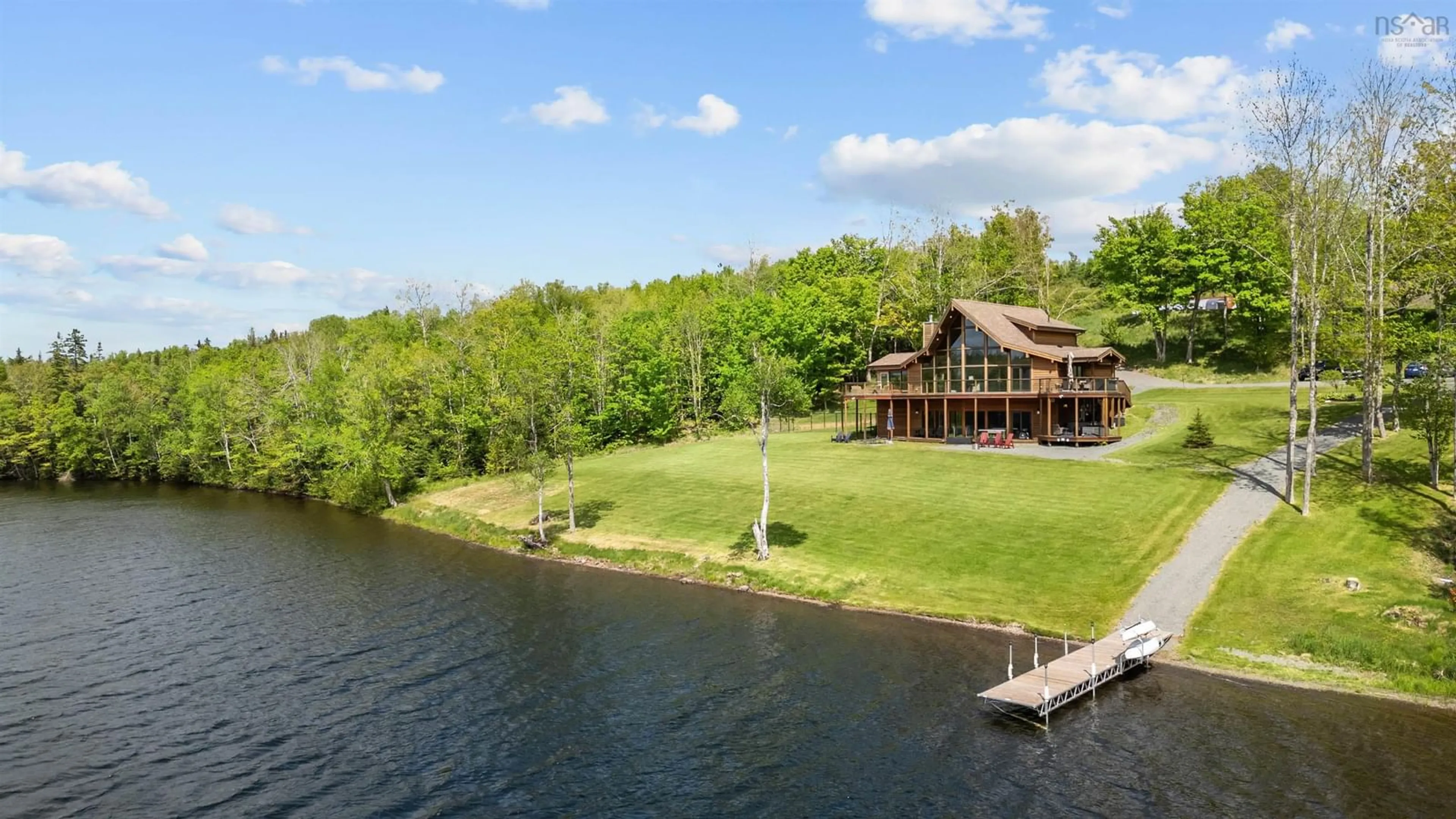 A pic from outside/outdoor area/front of a property/back of a property/a pic from drone, water/lake/river/ocean view for 16 Sunset Lane, Goshen Nova Scotia B0H 1E0