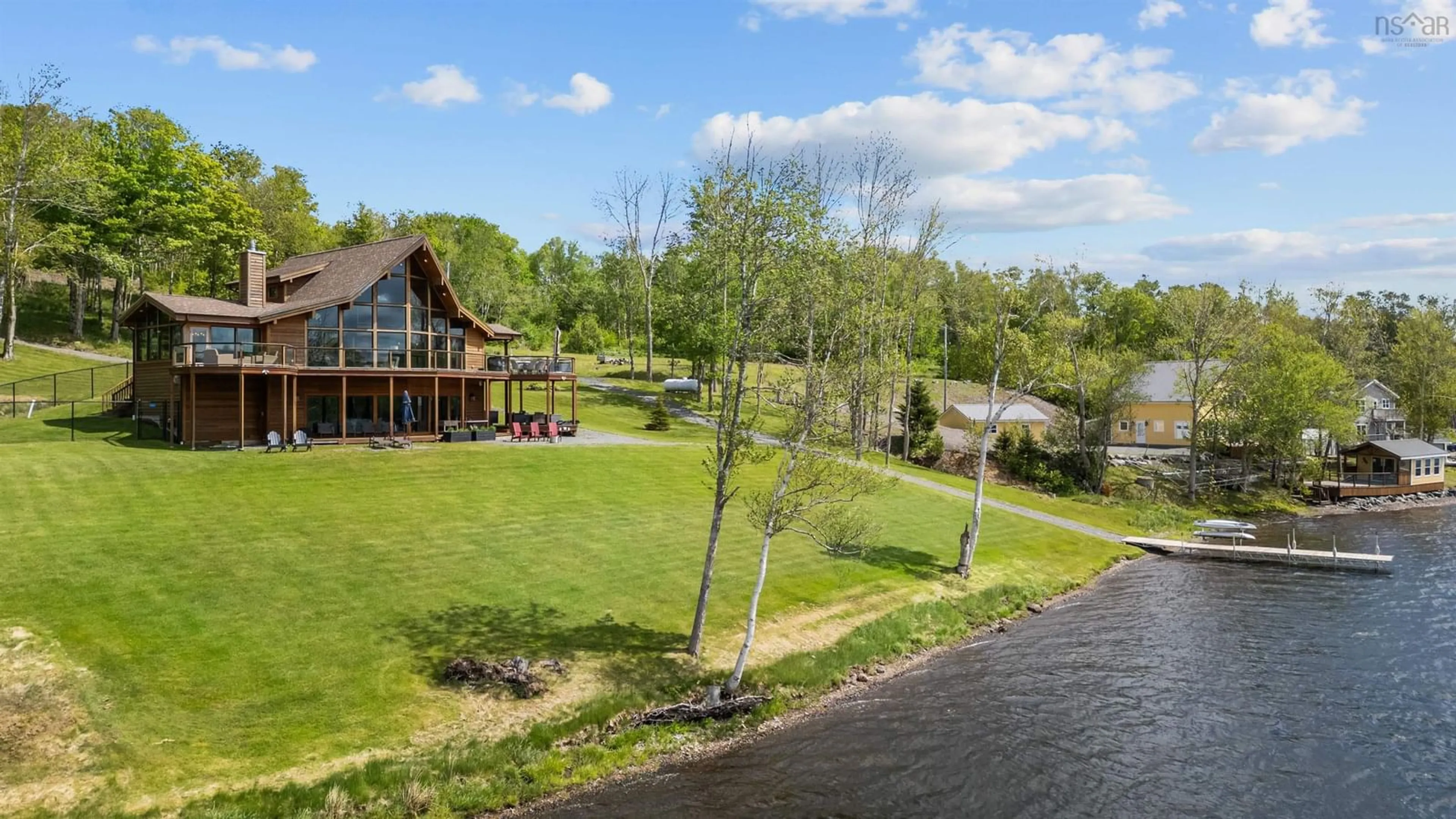 A pic from outside/outdoor area/front of a property/back of a property/a pic from drone, water/lake/river/ocean view for 16 Sunset Lane, Goshen Nova Scotia B0H 1E0