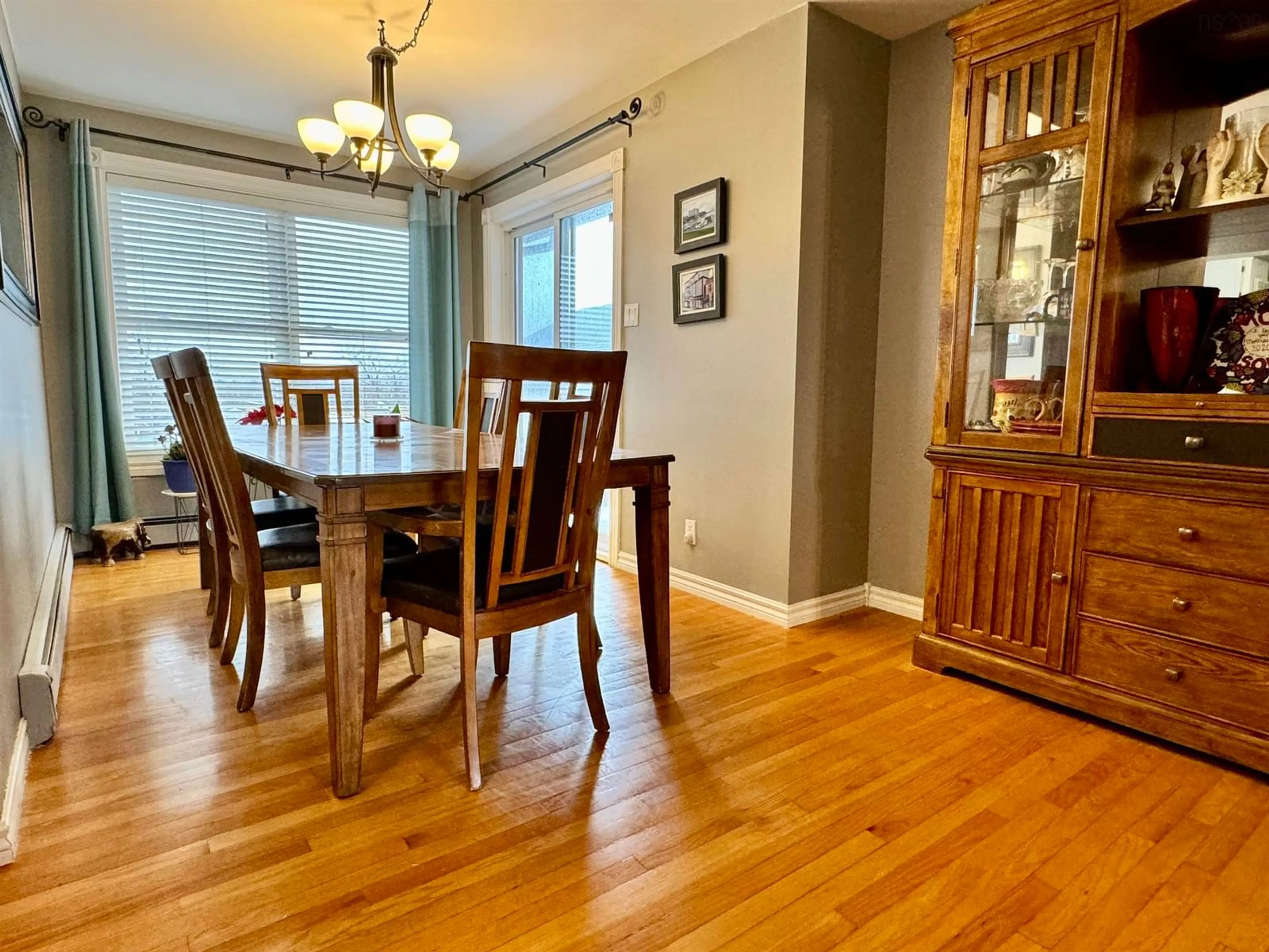 Dining room, wood/laminate floor for 213 Neville St, Dominion Nova Scotia B1G 1P9