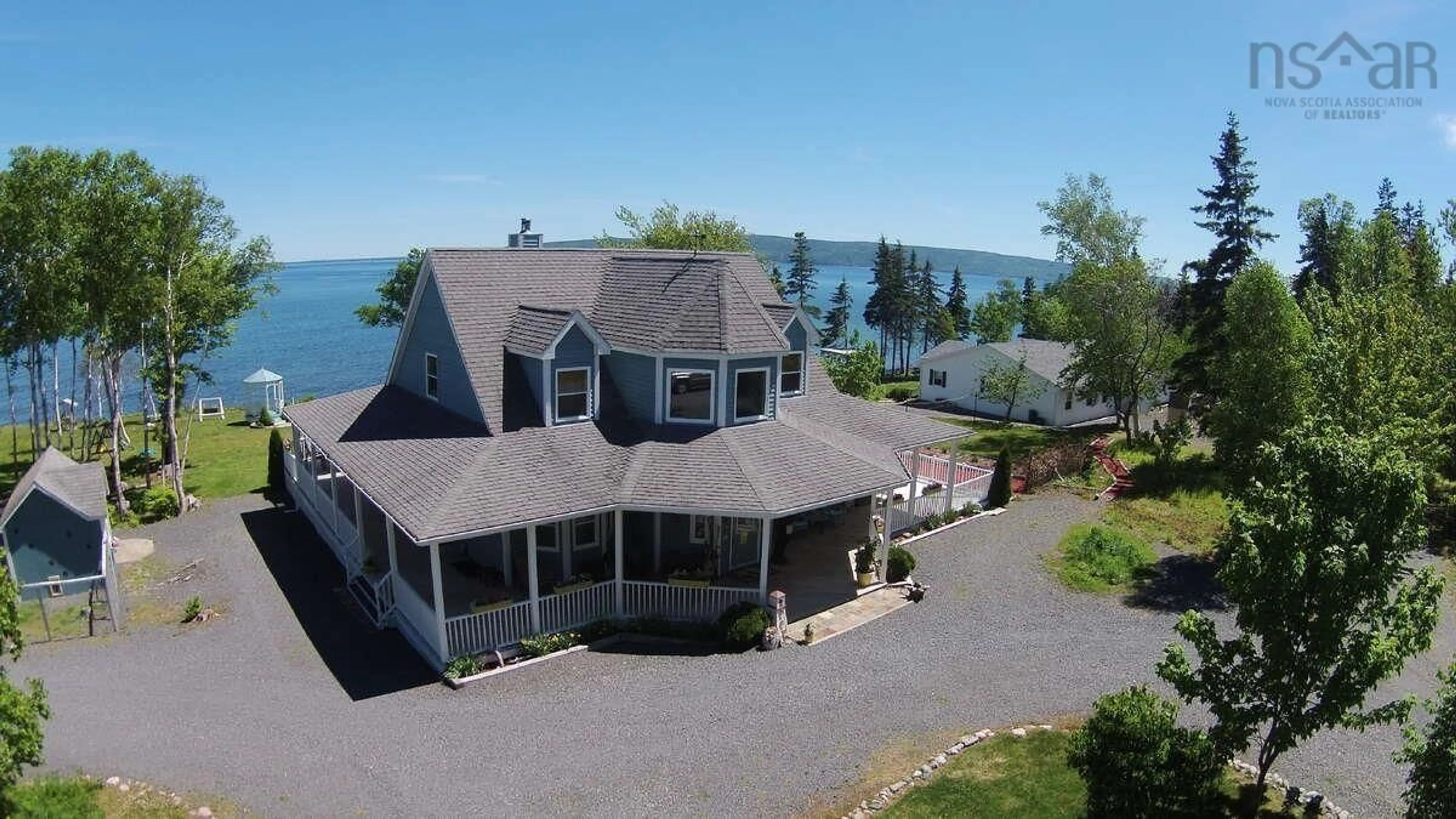 A pic from outside/outdoor area/front of a property/back of a property/a pic from drone, water/lake/river/ocean view for 45227 Cabot Trail, North Shore Nova Scotia B0C 1H0