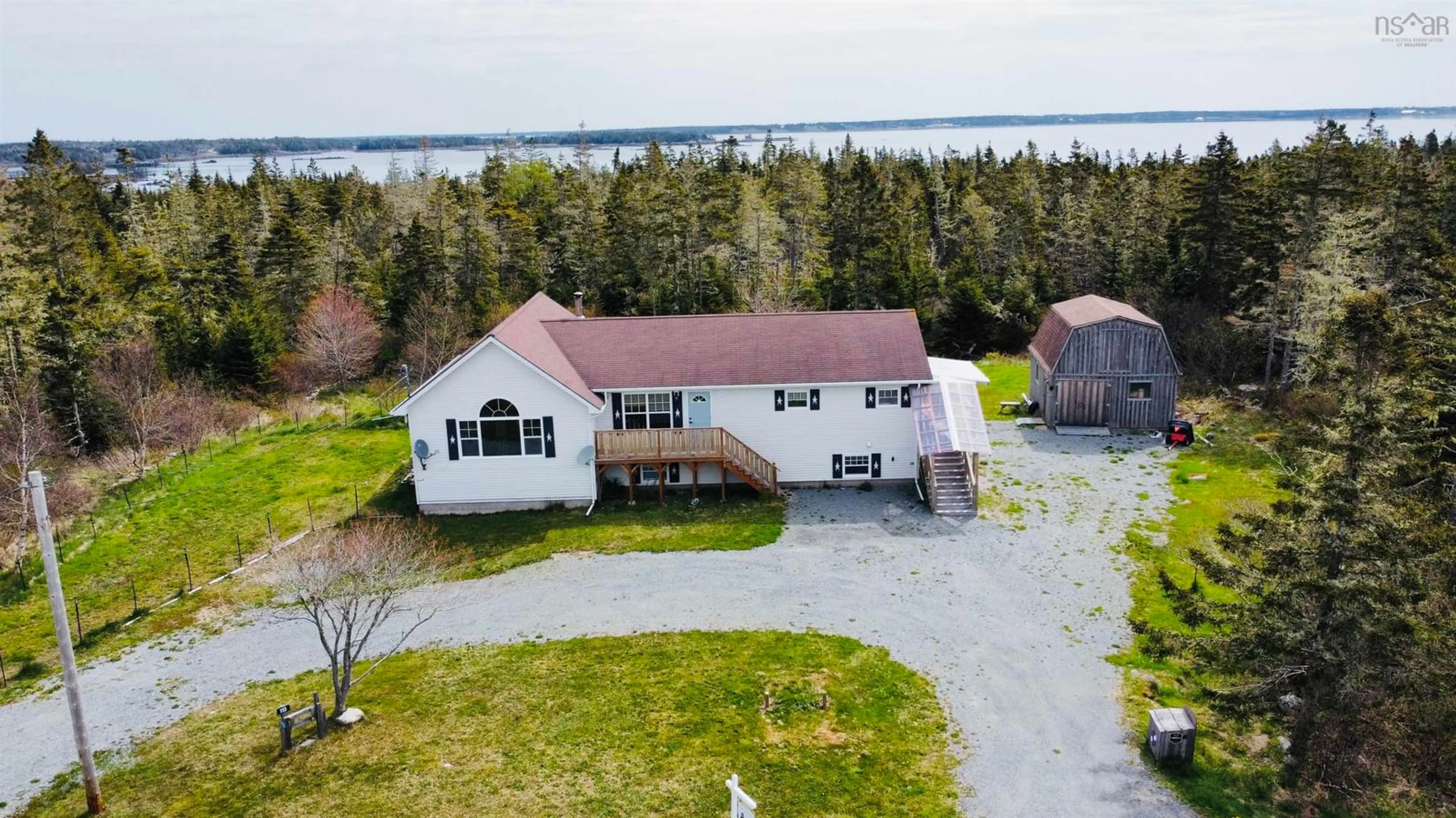 A pic from outside/outdoor area/front of a property/back of a property/a pic from drone, water/lake/river/ocean view for 113 Bear Point Rd, Shag Harbour Nova Scotia B0W 3B0