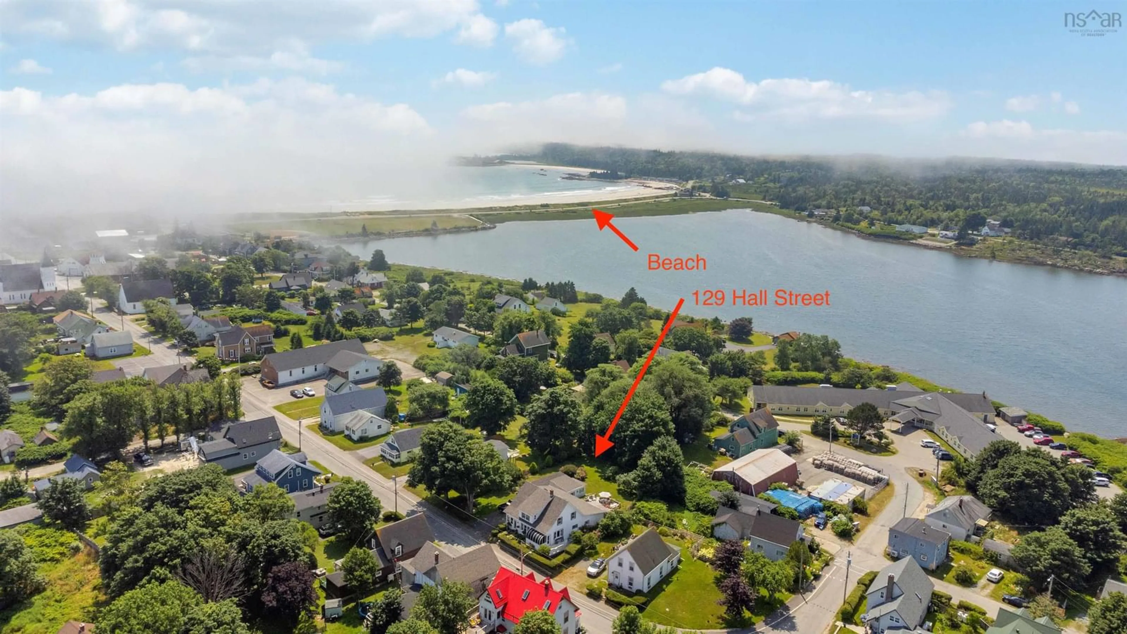 A pic from outside/outdoor area/front of a property/back of a property/a pic from drone, water/lake/river/ocean view for 129 Hall St, Lockeport Nova Scotia B0T 1L0