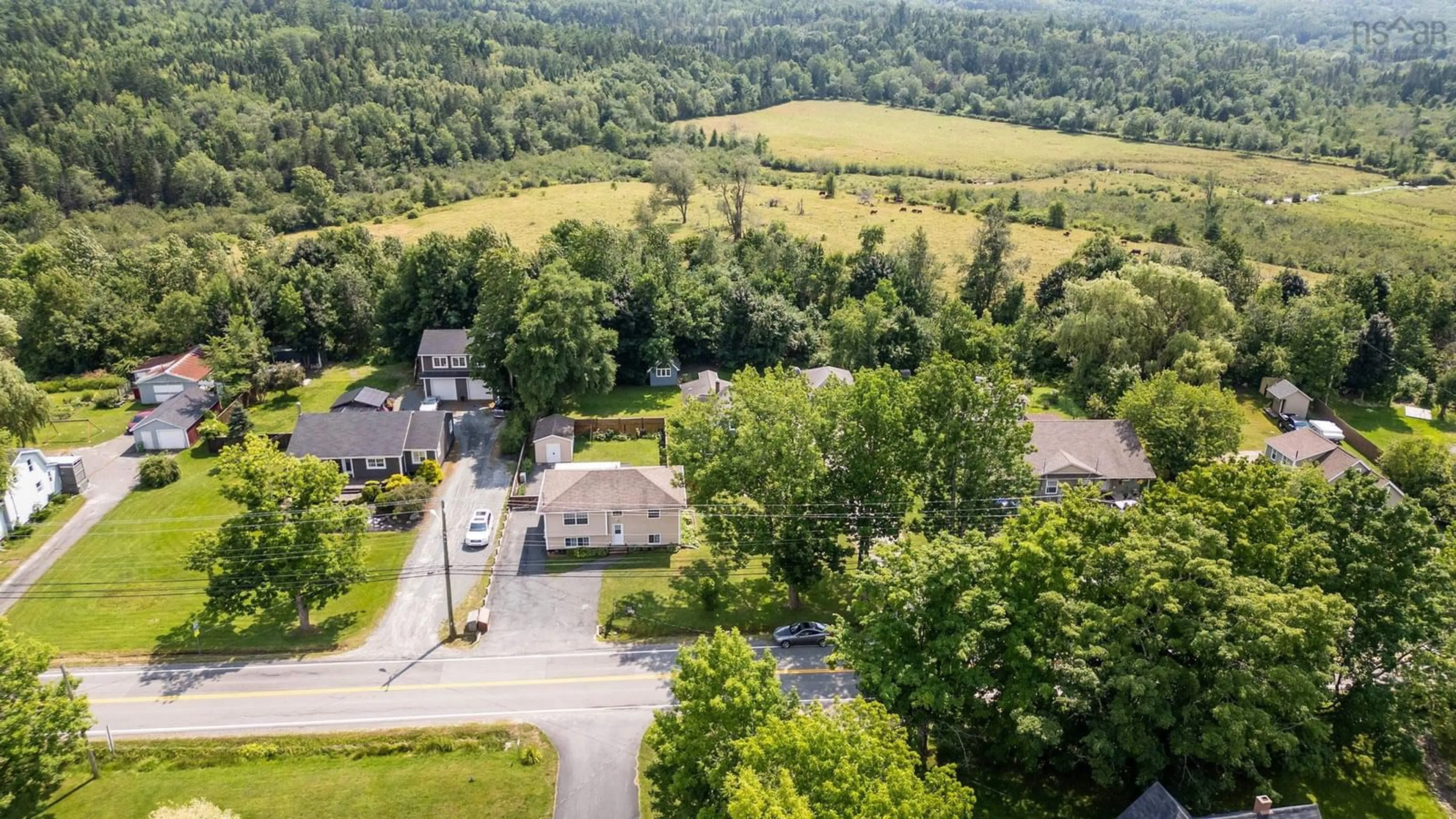 A pic from outside/outdoor area/front of a property/back of a property/a pic from drone, mountain view for 4578 Highway 1, Three Mile Plains Nova Scotia B0N 2T0