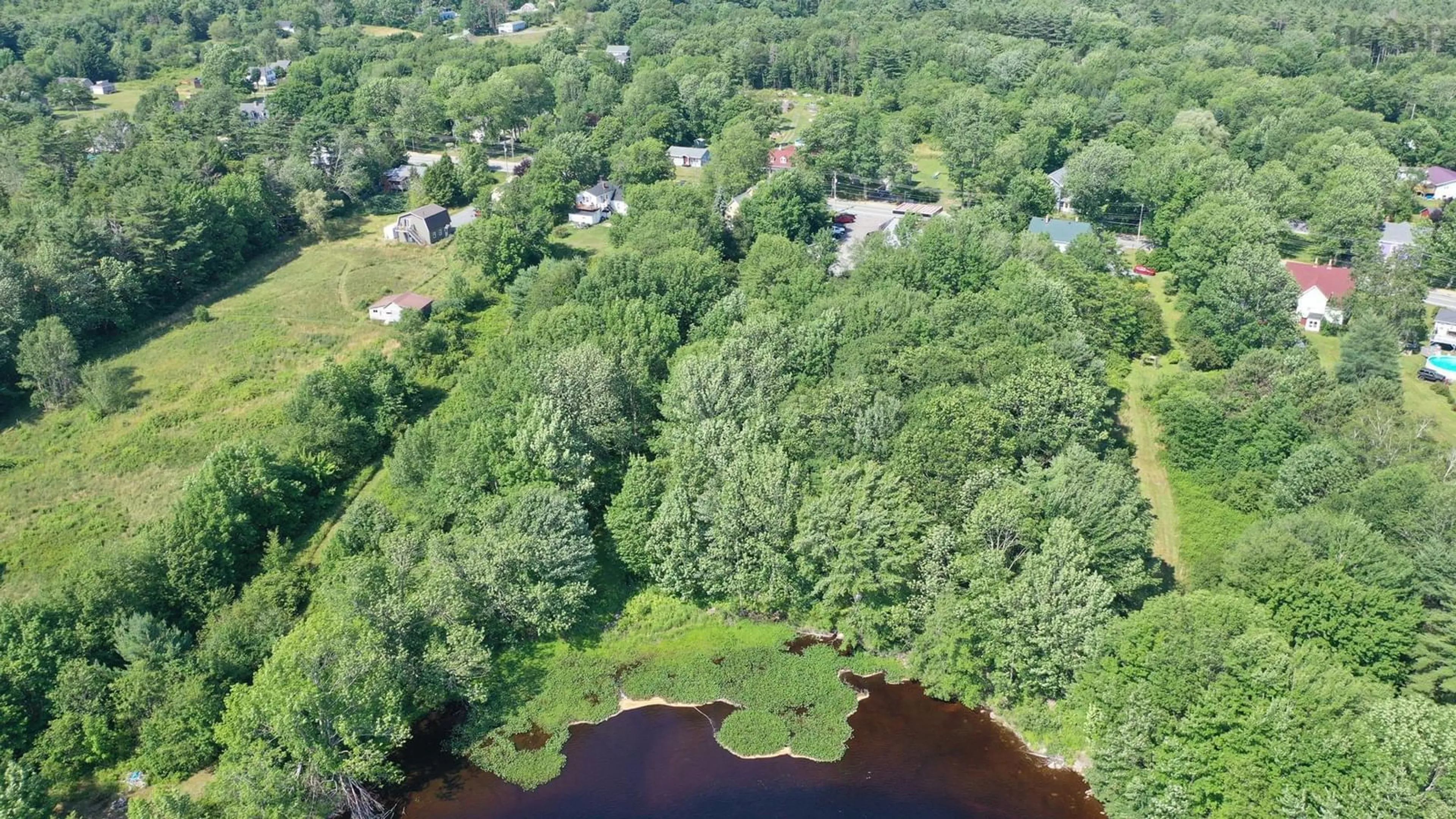 A pic from outside/outdoor area/front of a property/back of a property/a pic from drone, water/lake/river/ocean view for 380 Highway 8, Milton Nova Scotia B0T 1P0