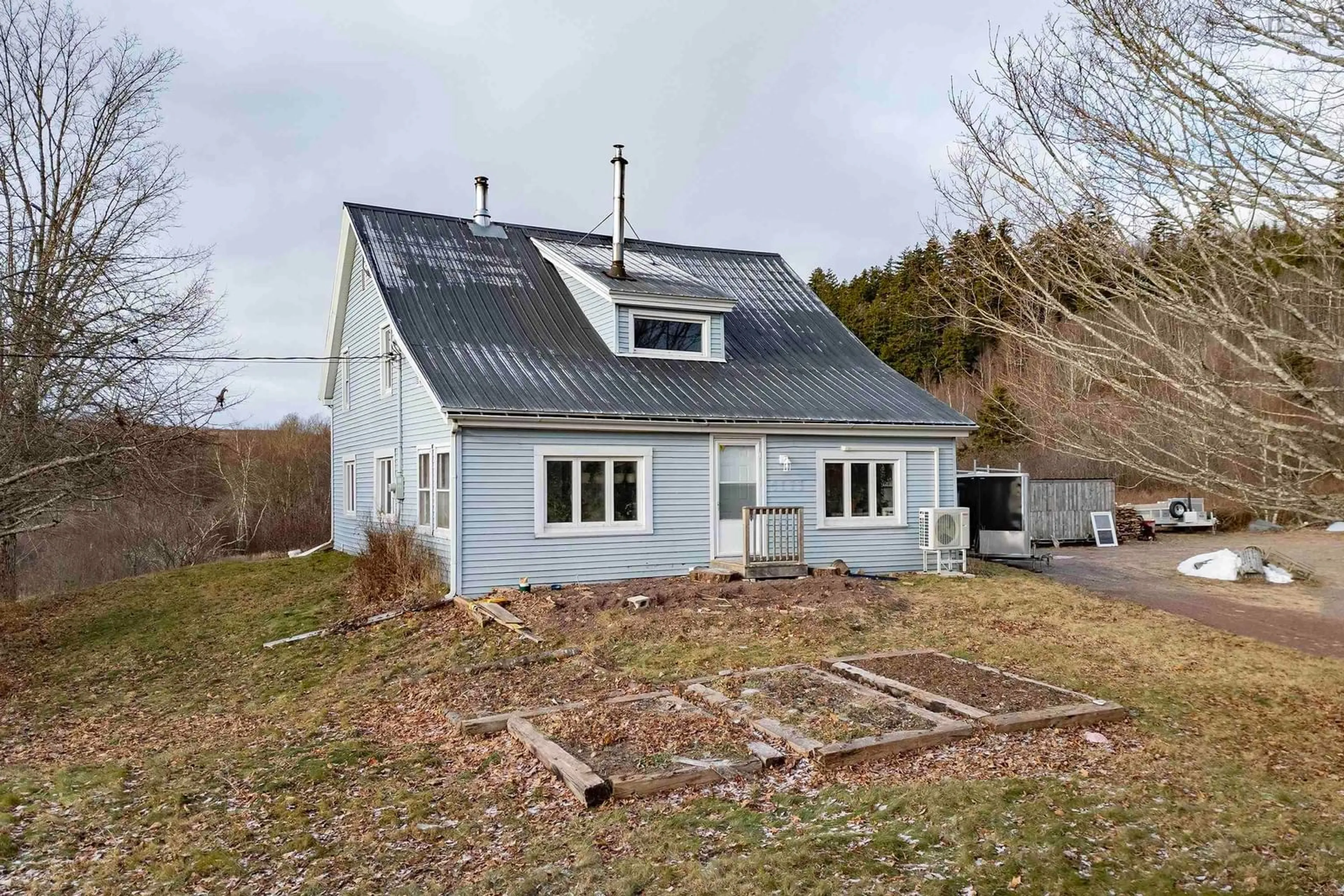 A pic from outside/outdoor area/front of a property/back of a property/a pic from drone, building for 6173 Highway 2, Halfway River Nova Scotia B0M 1W0