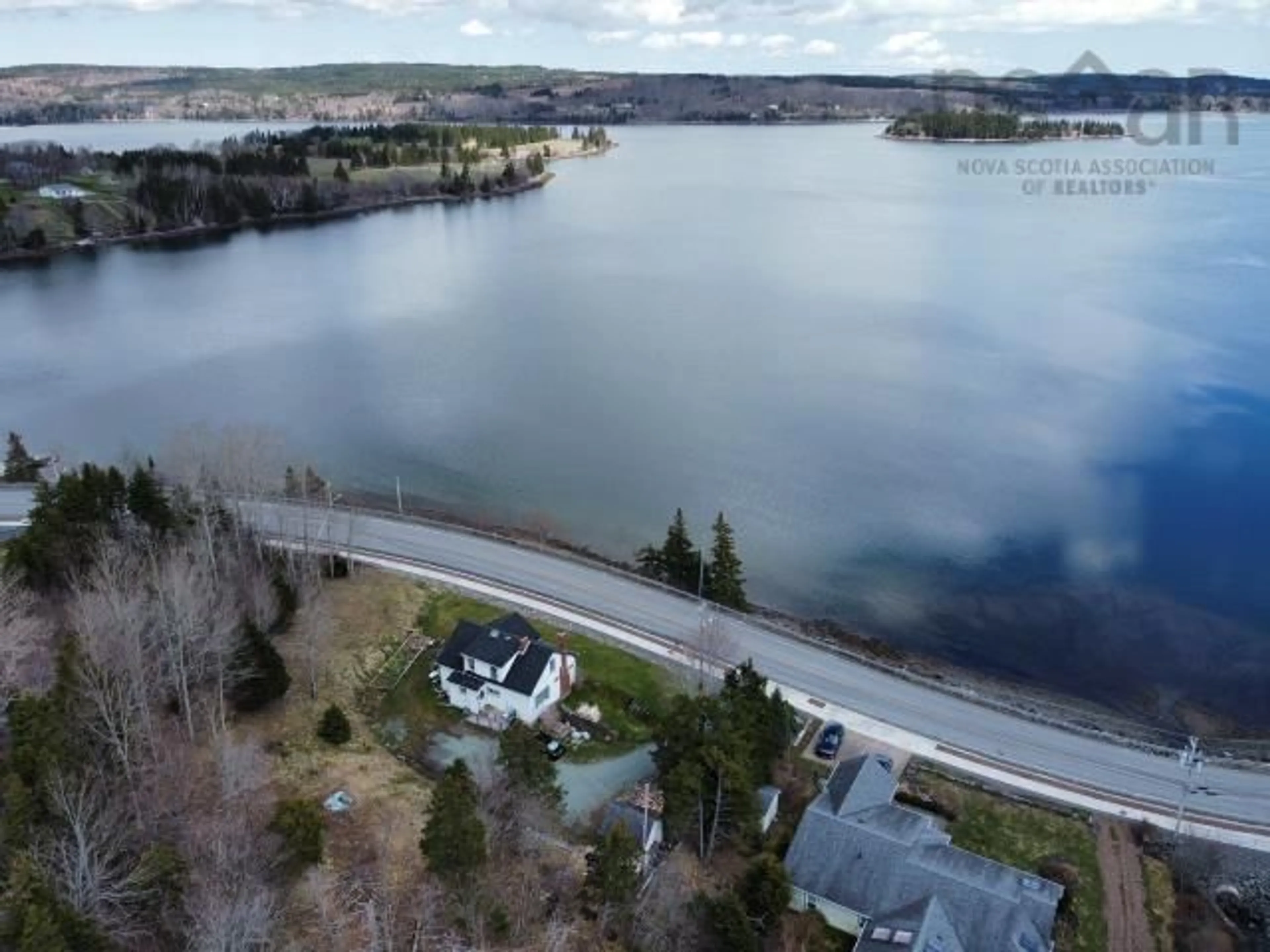 A pic from outside/outdoor area/front of a property/back of a property/a pic from drone, water/lake/river/ocean view for 209 Main Street, Guysborough Nova Scotia B0H 1N0