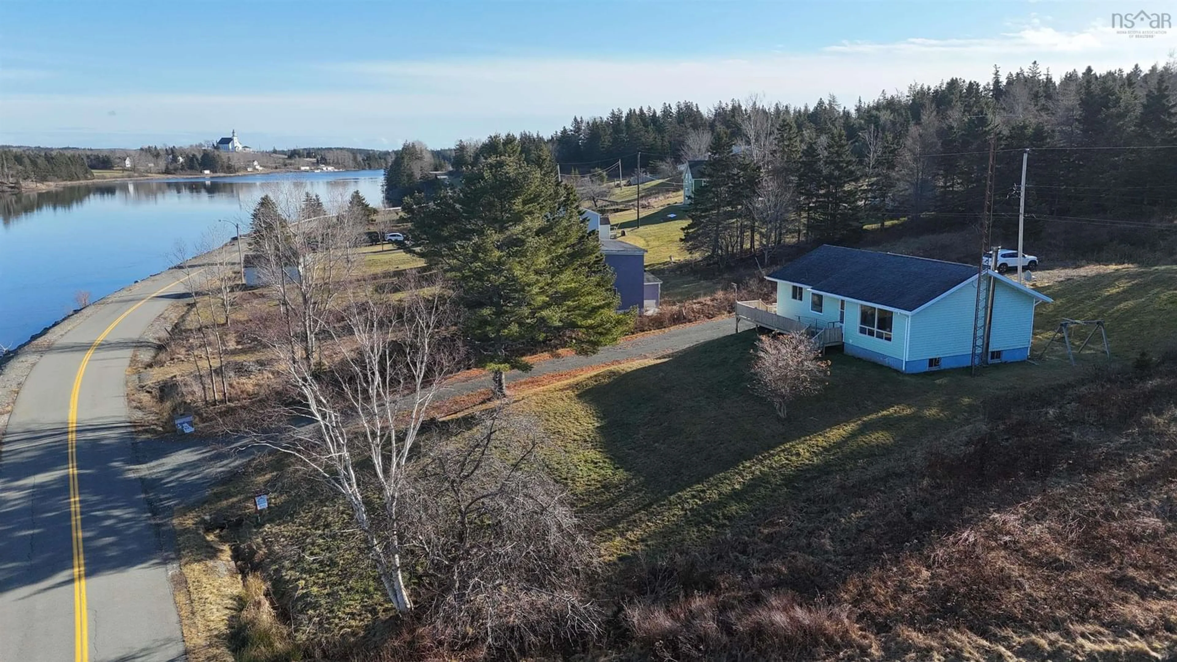 A pic from outside/outdoor area/front of a property/back of a property/a pic from drone, water/lake/river/ocean view for 442 South Side River Bourgeois Rd, River Bourgeois Nova Scotia B0E 2X0