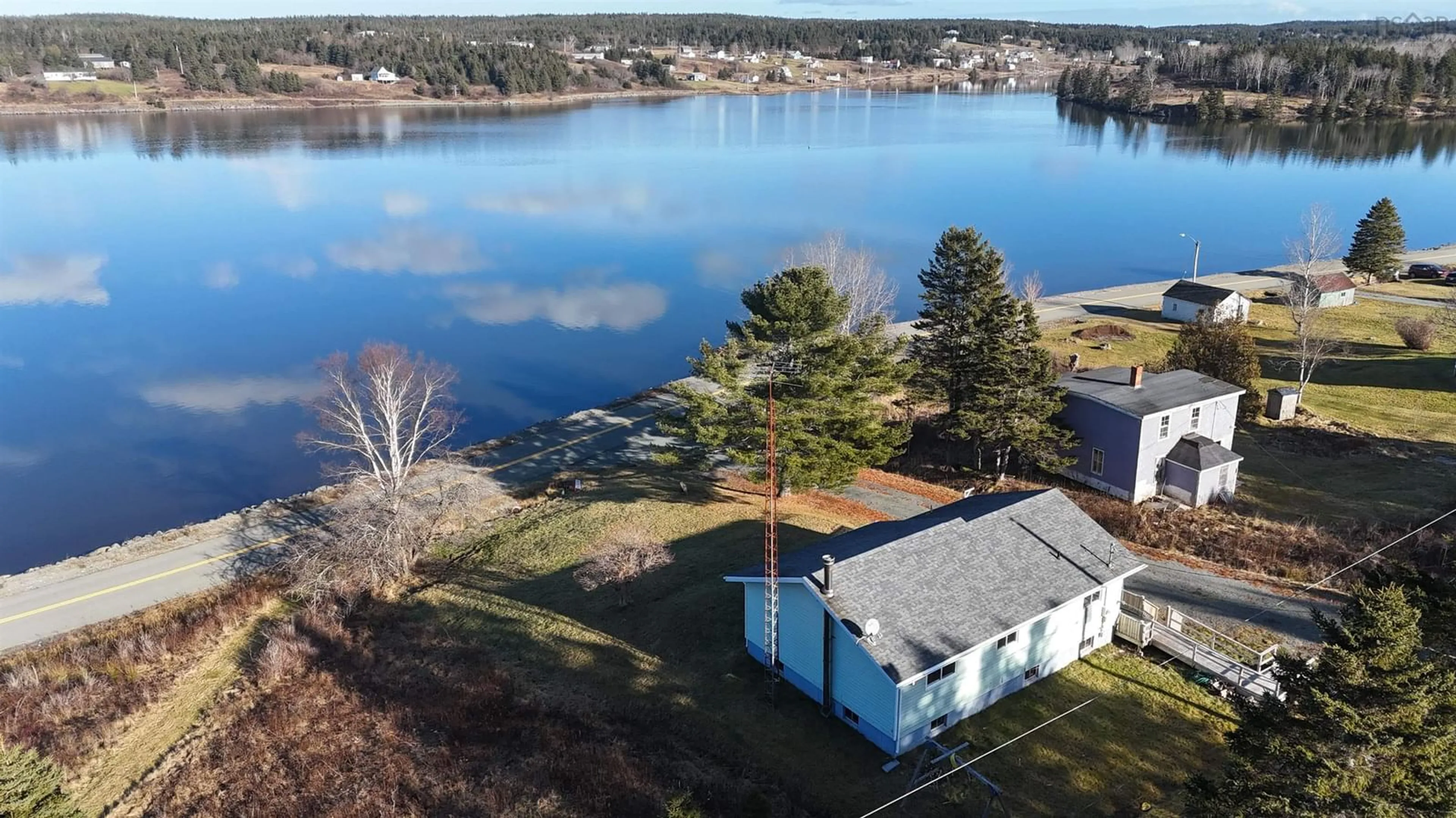 A pic from outside/outdoor area/front of a property/back of a property/a pic from drone, water/lake/river/ocean view for 442 South Side River Bourgeois Rd, River Bourgeois Nova Scotia B0E 2X0