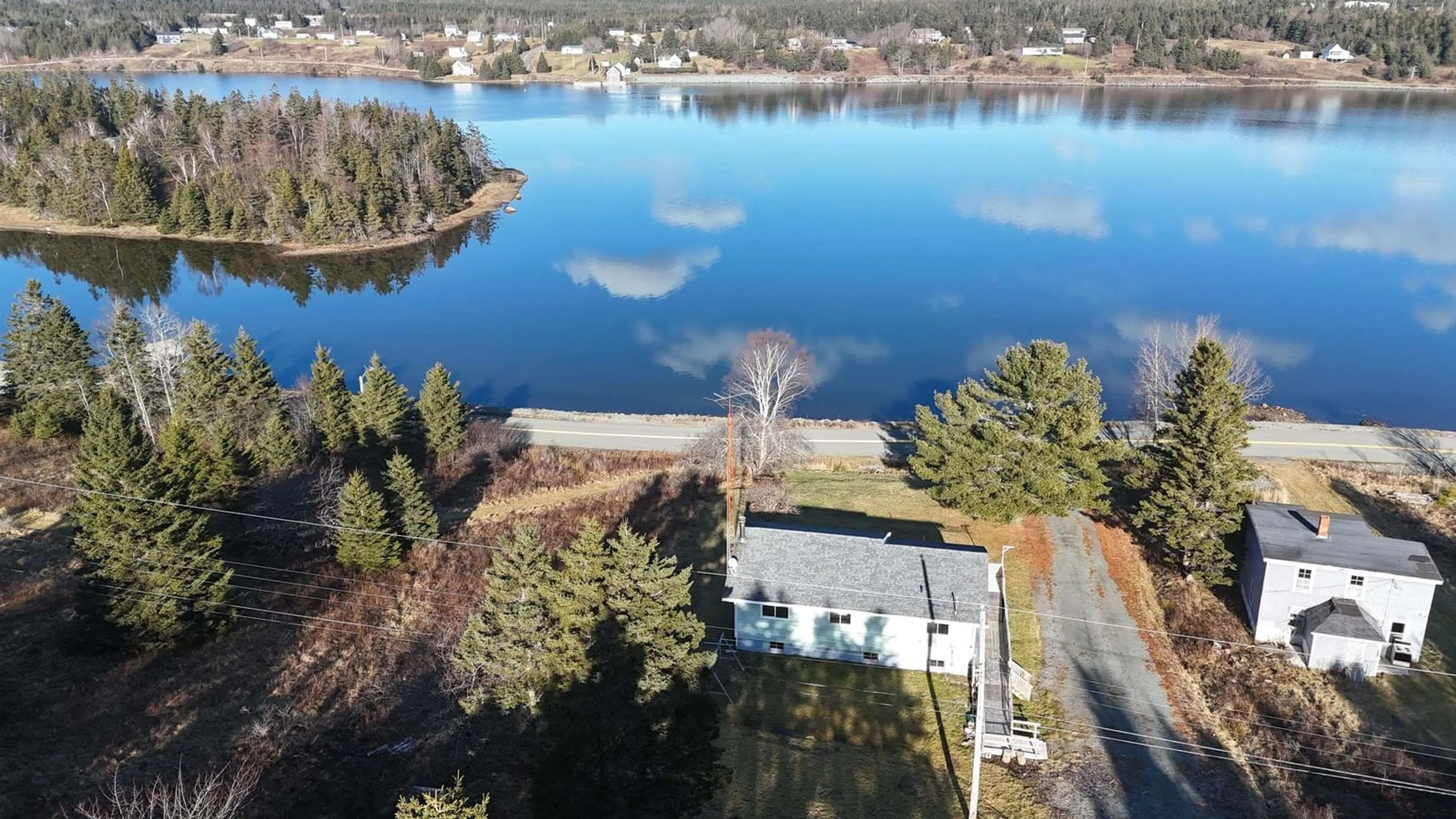 A pic from outside/outdoor area/front of a property/back of a property/a pic from drone, water/lake/river/ocean view for 442 South Side River Bourgeois Rd, River Bourgeois Nova Scotia B0E 2X0