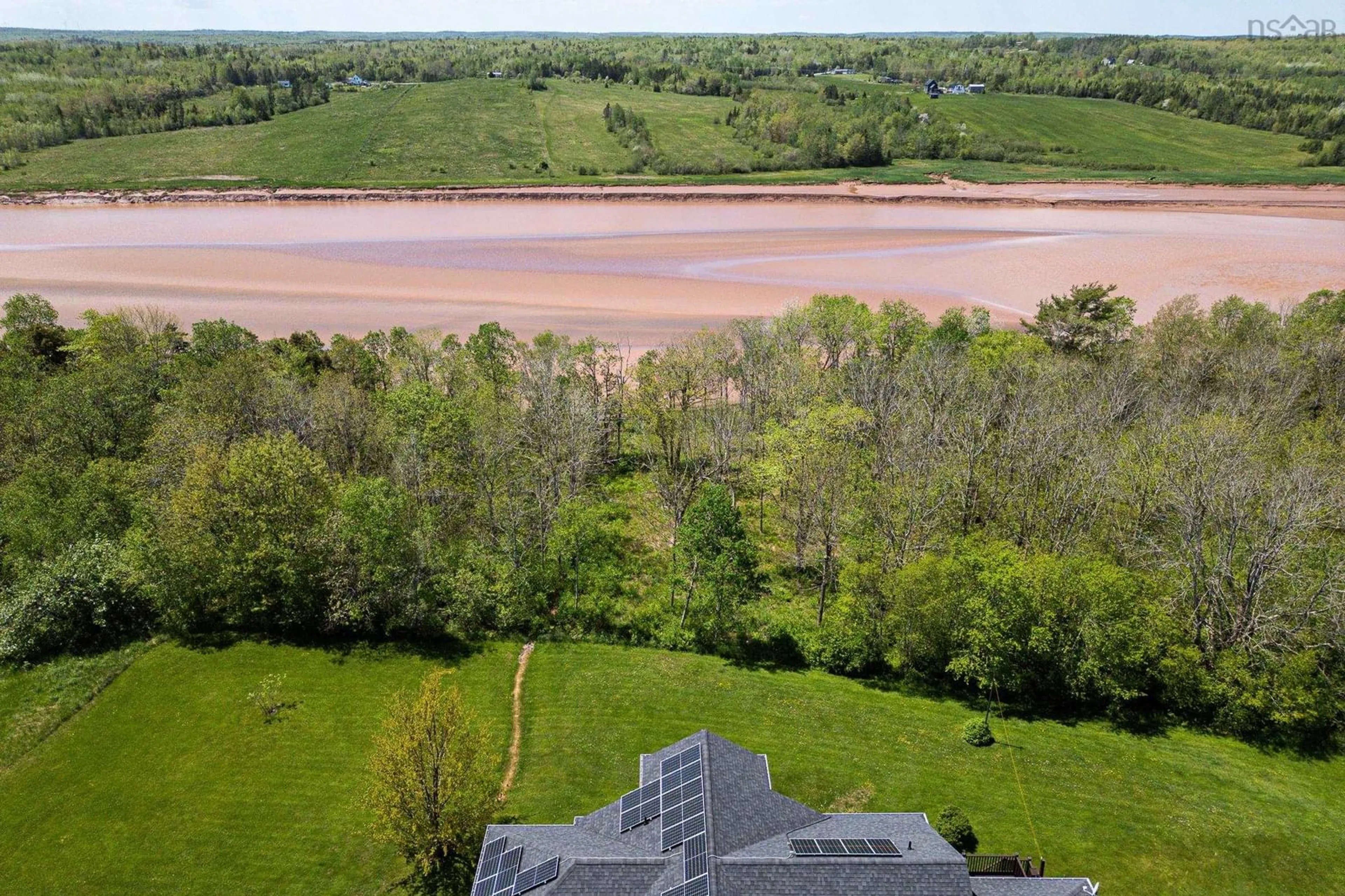 A pic from outside/outdoor area/front of a property/back of a property/a pic from drone, water/lake/river/ocean view for 807 Riverside Rd, Fort Ellis Nova Scotia B0N 2J0