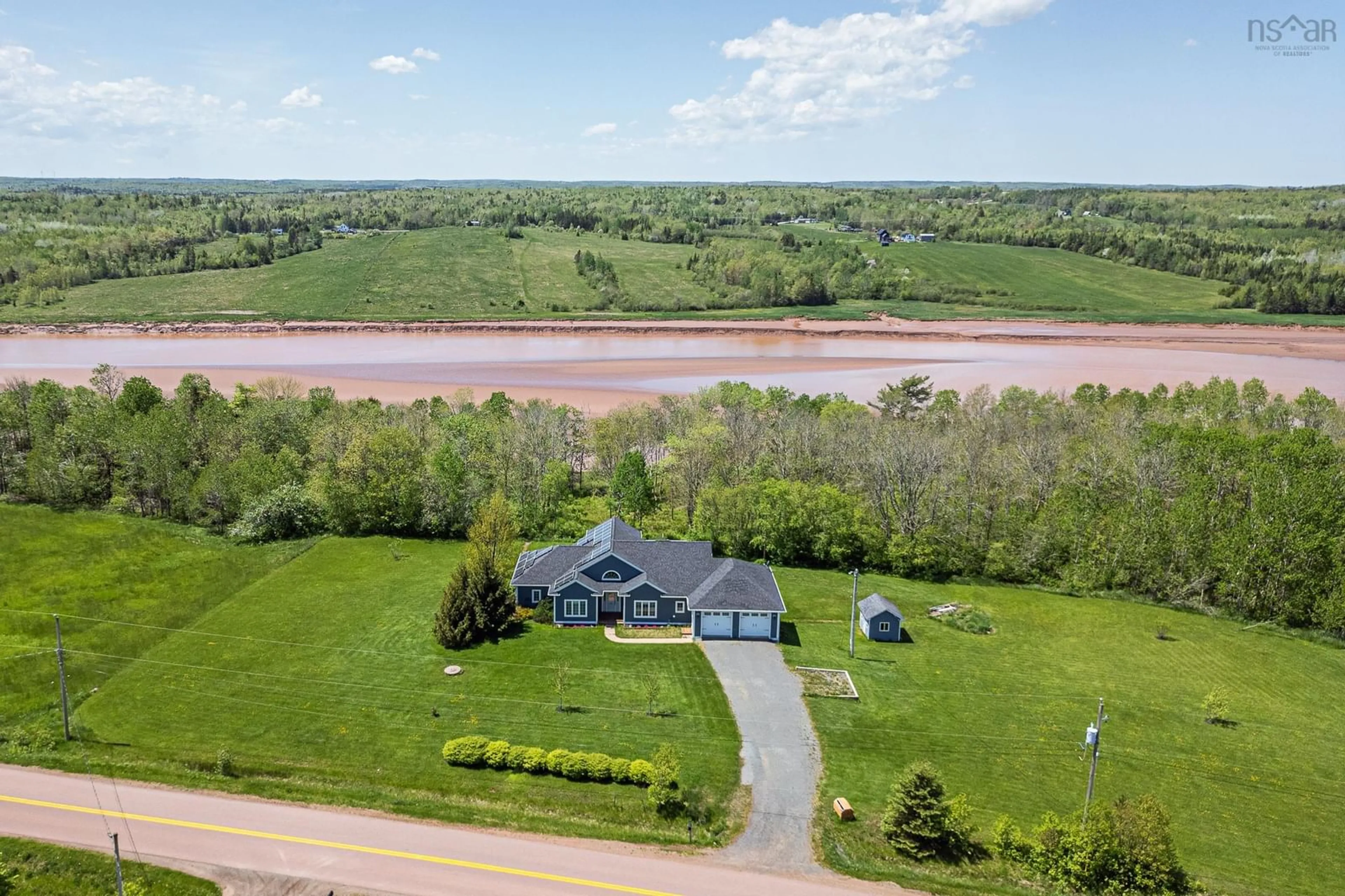 A pic from outside/outdoor area/front of a property/back of a property/a pic from drone, water/lake/river/ocean view for 807 Riverside Rd, Fort Ellis Nova Scotia B0N 2J0