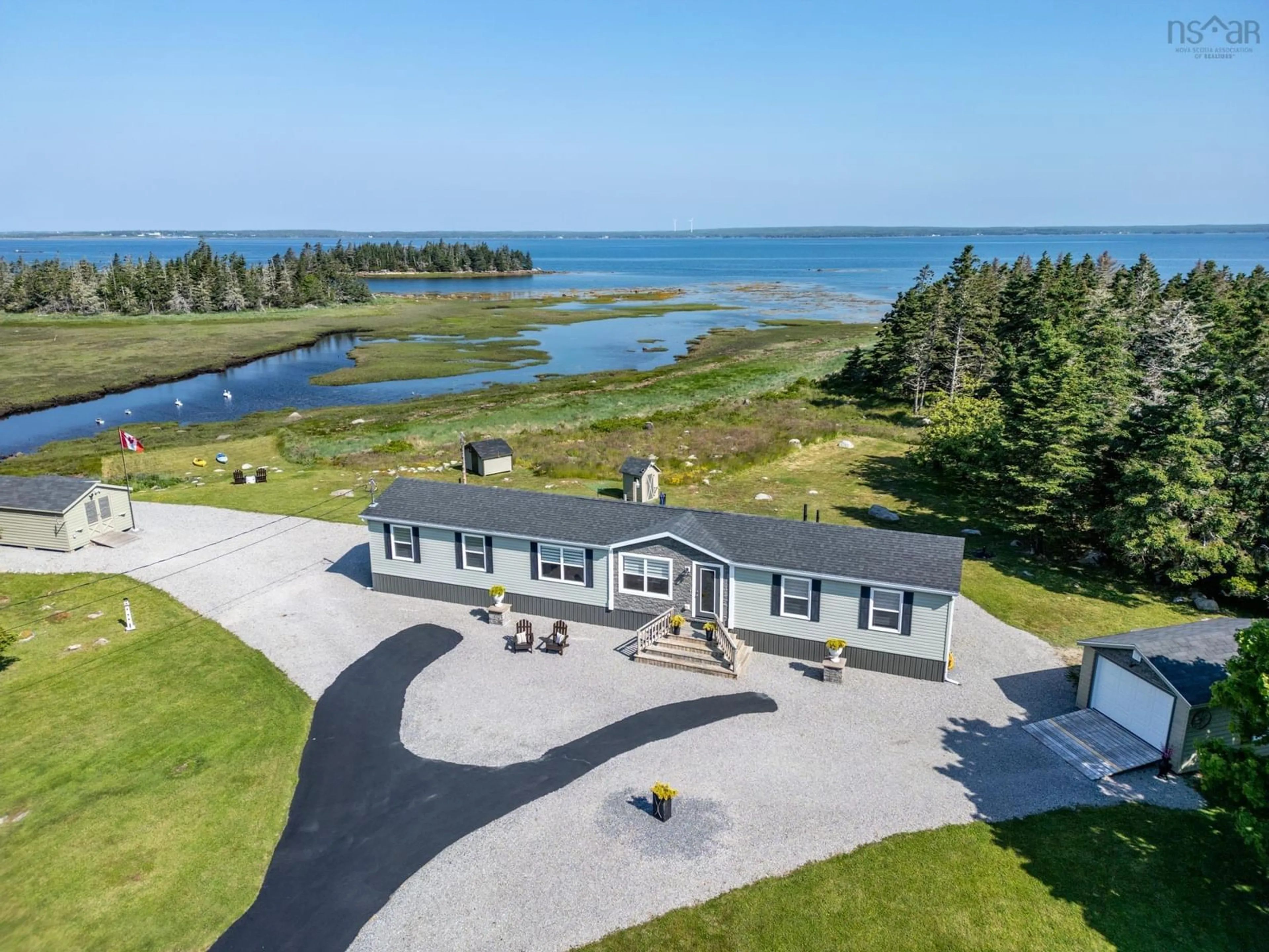 A pic from outside/outdoor area/front of a property/back of a property/a pic from drone, water/lake/river/ocean view for 1480 Highway 330, Newellton Nova Scotia B0W 1P0