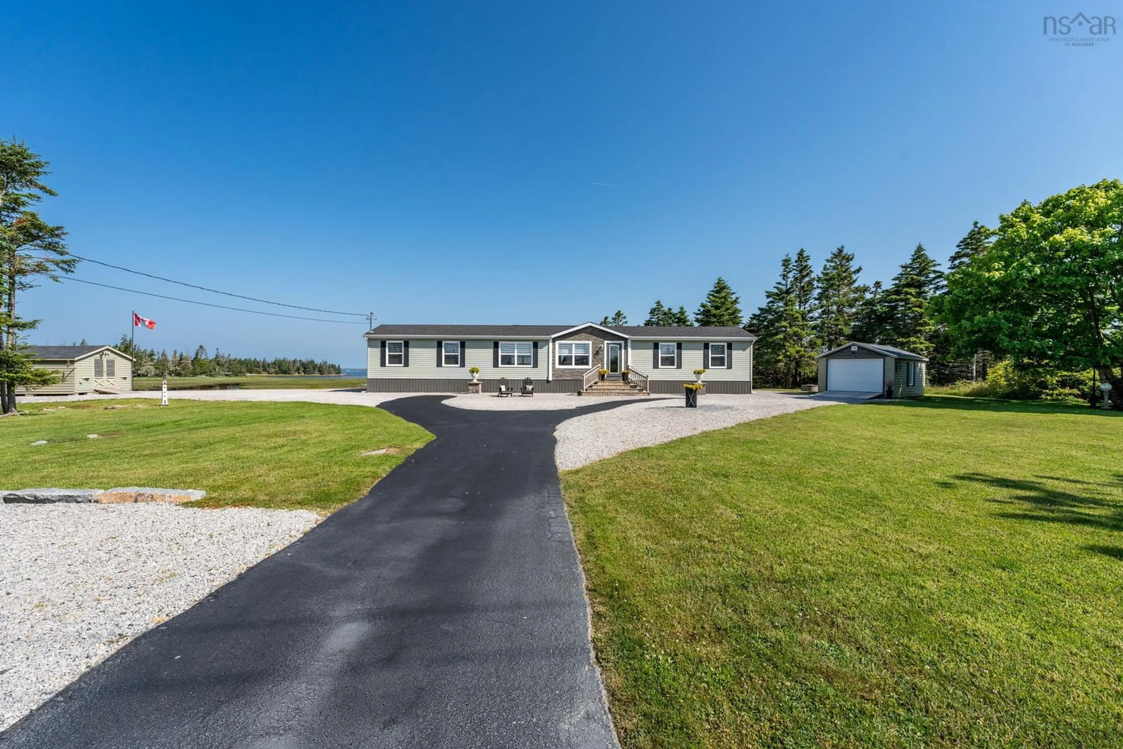 A pic from outside/outdoor area/front of a property/back of a property/a pic from drone, water/lake/river/ocean view for 1480 Highway 330, Newellton Nova Scotia B0W 1P0