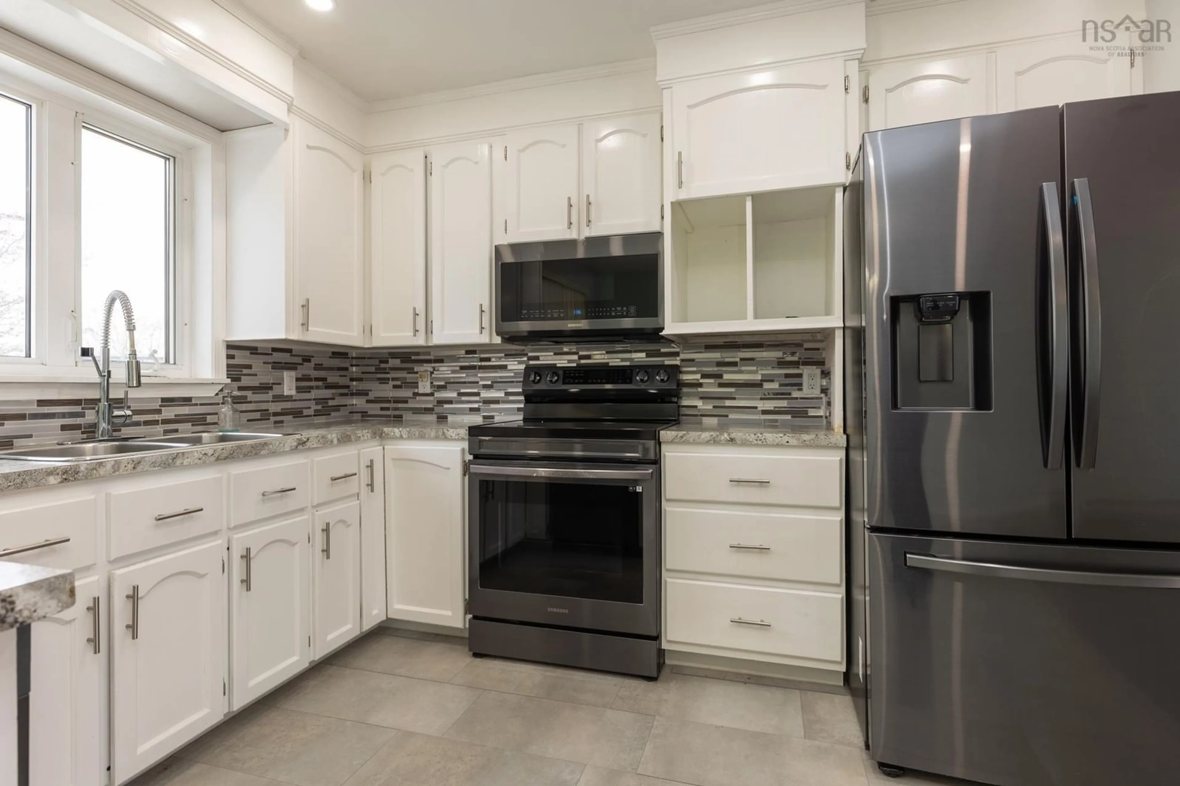 Open concept kitchen, ceramic/tile floor for 486 Brunswick St, Yarmouth Nova Scotia B5A 4S1