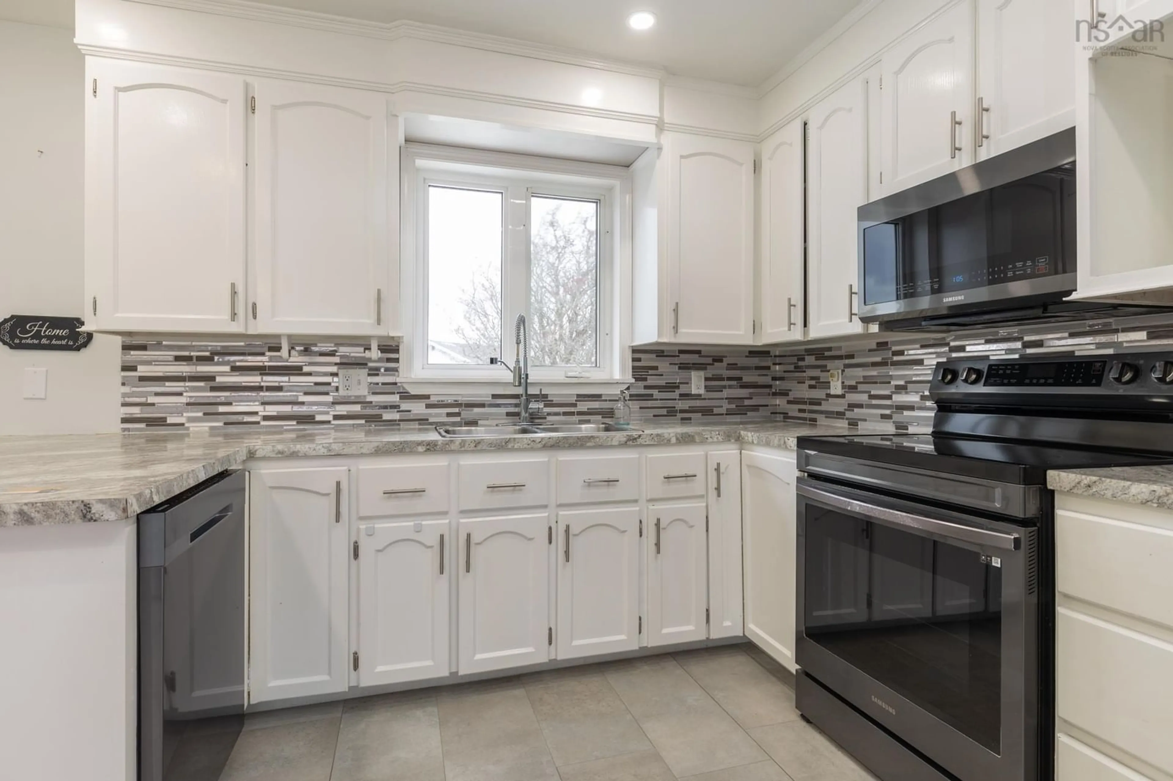 Open concept kitchen, ceramic/tile floor for 486 Brunswick St, Yarmouth Nova Scotia B5A 4S1