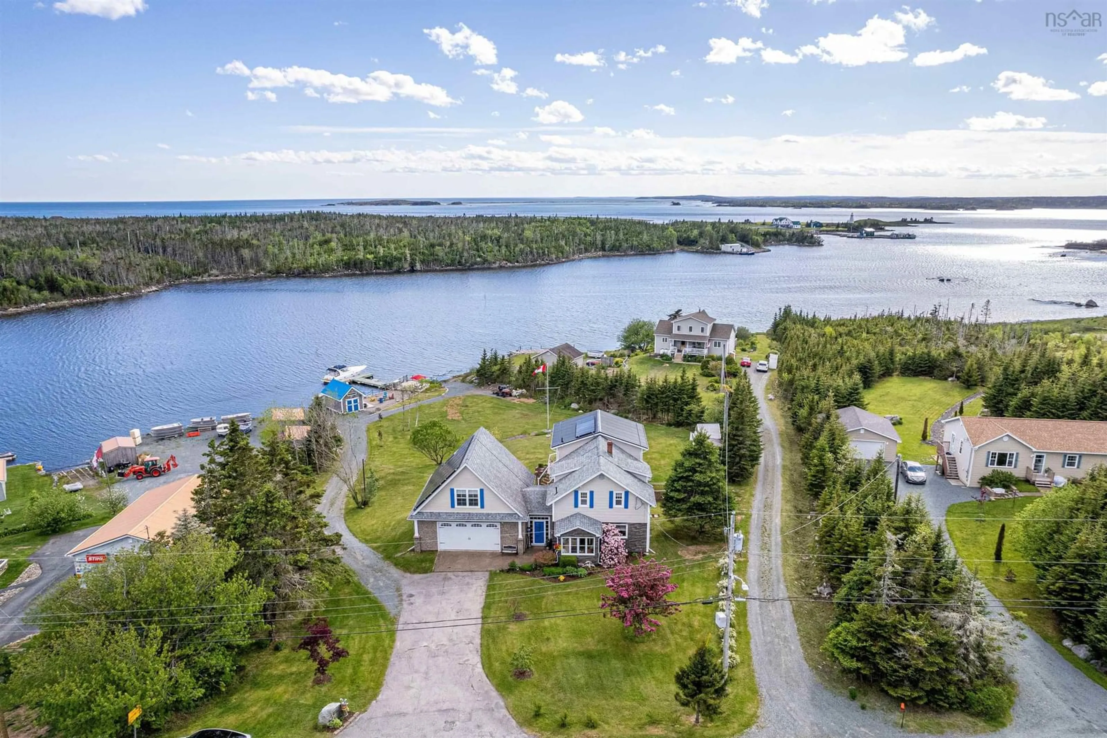 A pic from outside/outdoor area/front of a property/back of a property/a pic from drone, water/lake/river/ocean view for 2270 Ostrea Lake Rd, Ostrea Lake Nova Scotia B0J 2L0