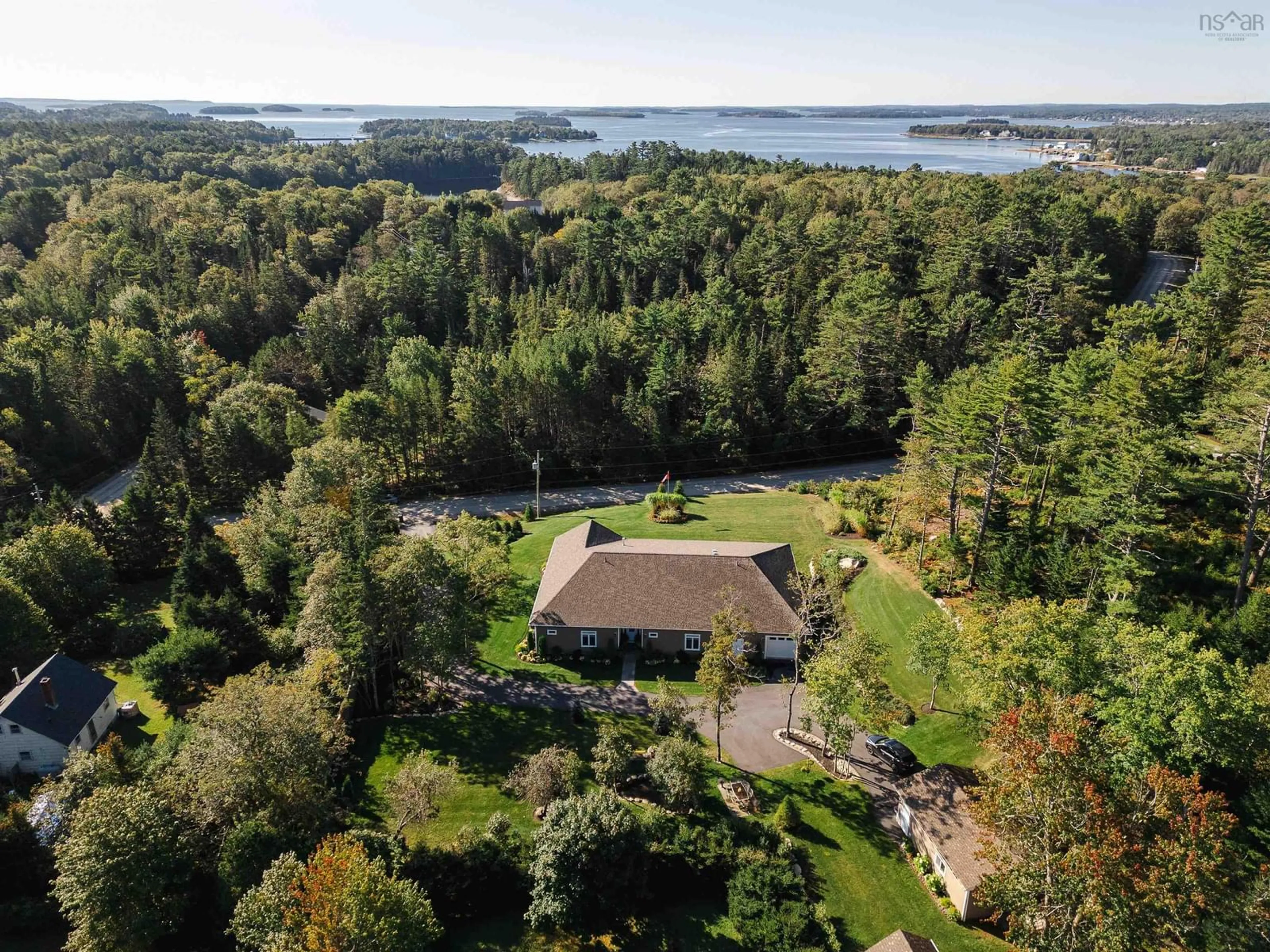 A pic from outside/outdoor area/front of a property/back of a property/a pic from drone, water/lake/river/ocean view for 10 Swallow Point Rd, Chester Basin Nova Scotia B0J 1K0