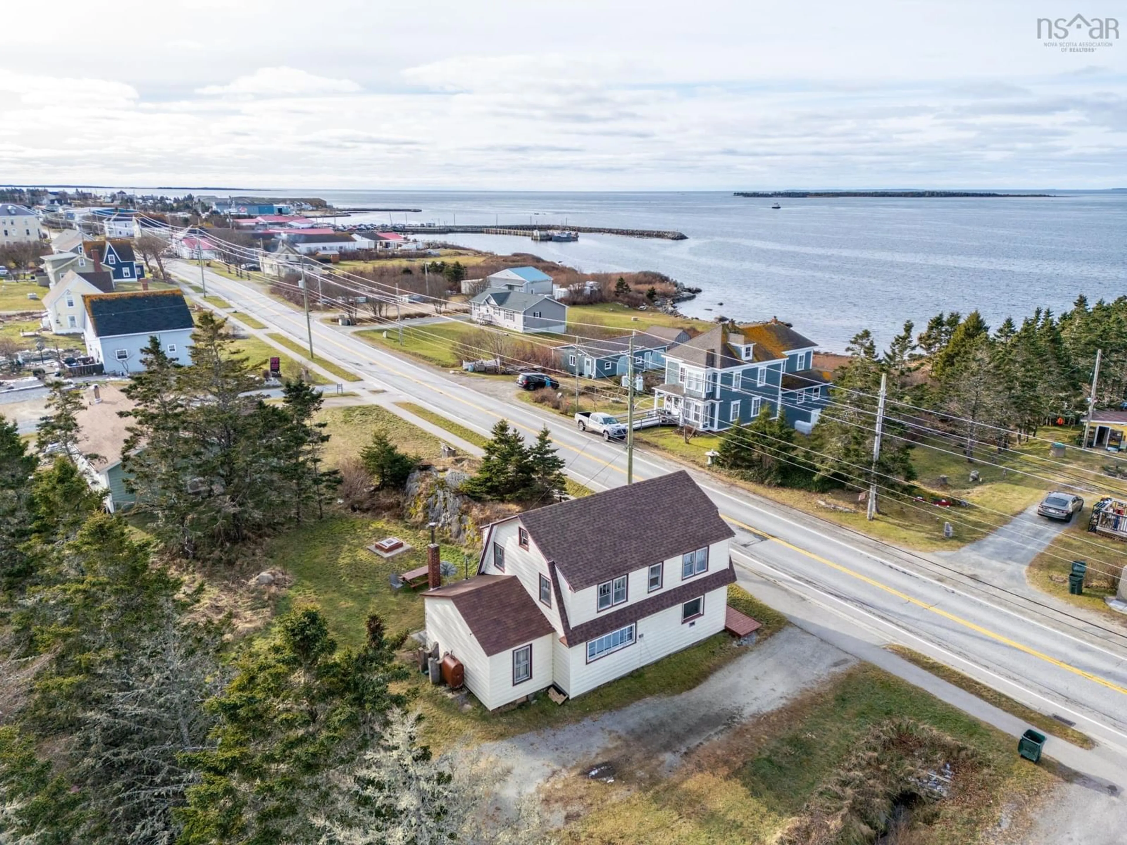 A pic from outside/outdoor area/front of a property/back of a property/a pic from drone, water/lake/river/ocean view for 6622 Highway 3, Lower Woods Harbour Nova Scotia B0W 2E0